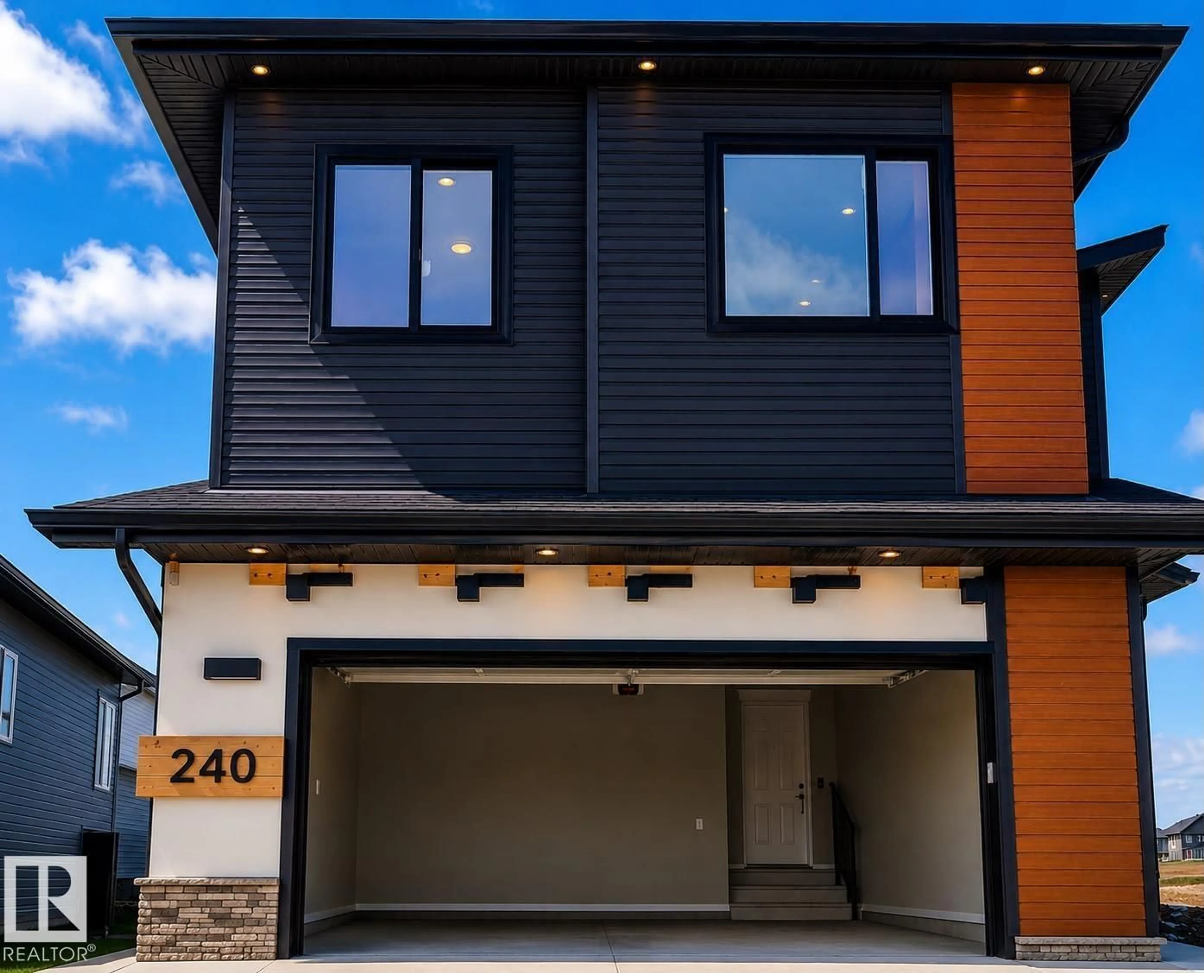 Home with vinyl exterior material, street for 240 166 AV, Edmonton Alberta T5Y4J2