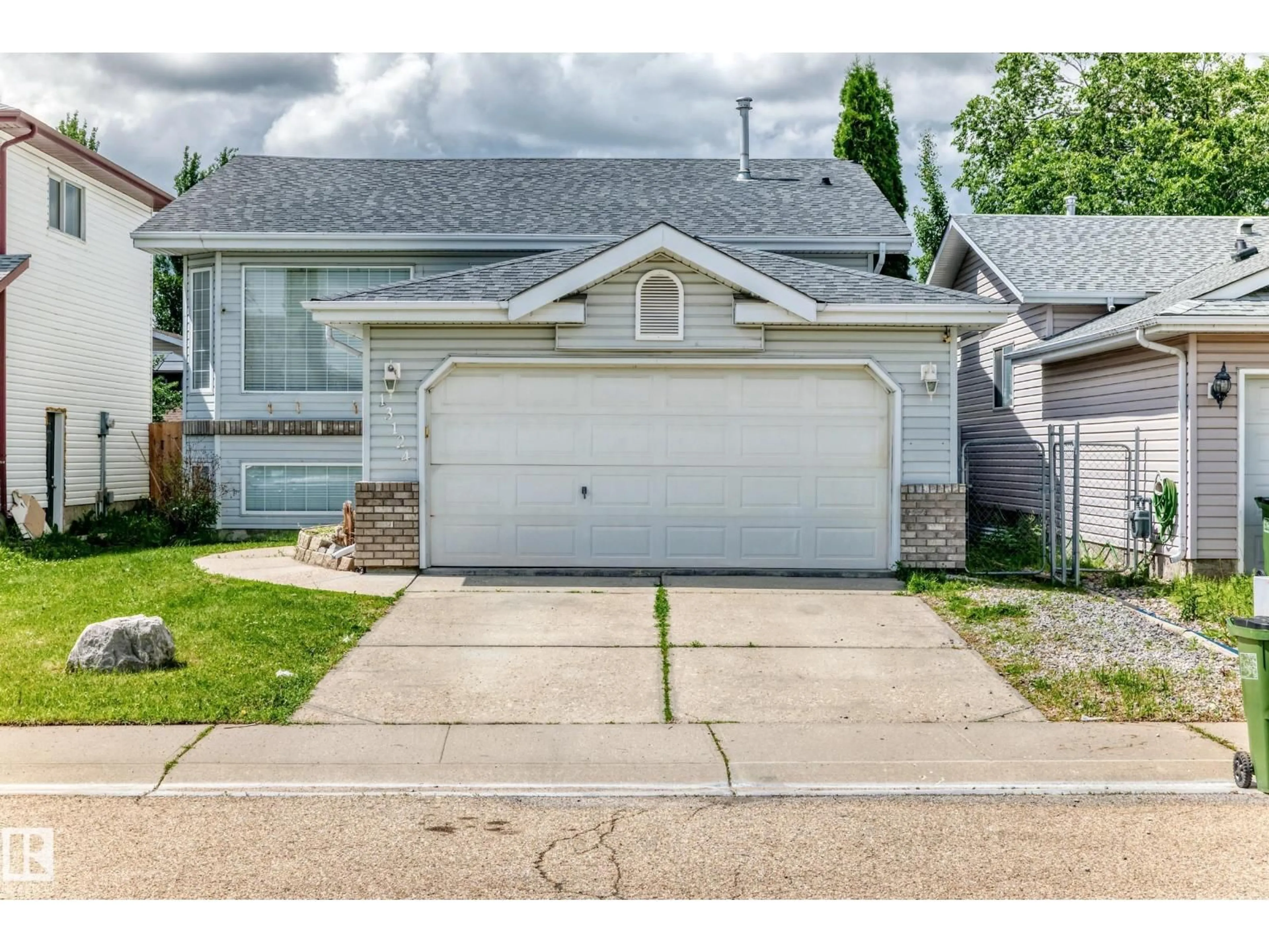 Home with vinyl exterior material, street for 13124 36 ST, Edmonton Alberta T5A5C7