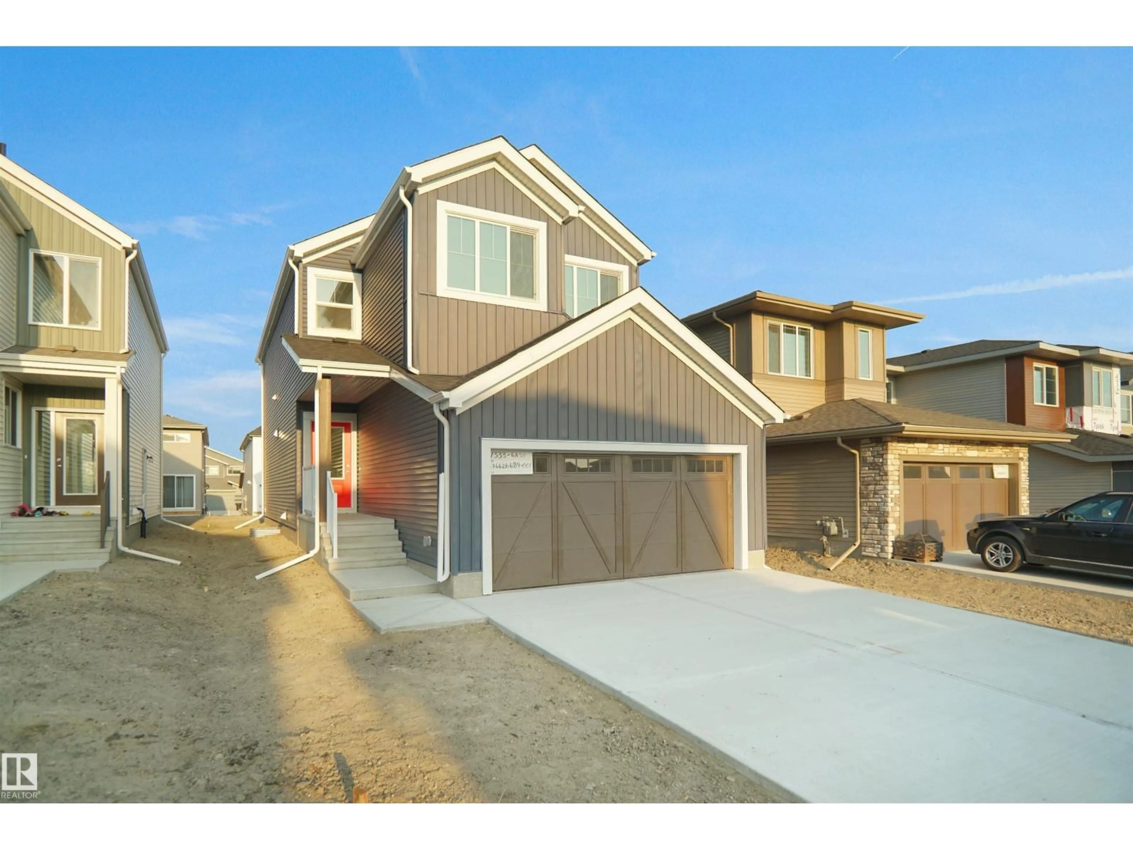 Home with vinyl exterior material, street for NE - 17715 7 ST, Edmonton Alberta T5Y4E9