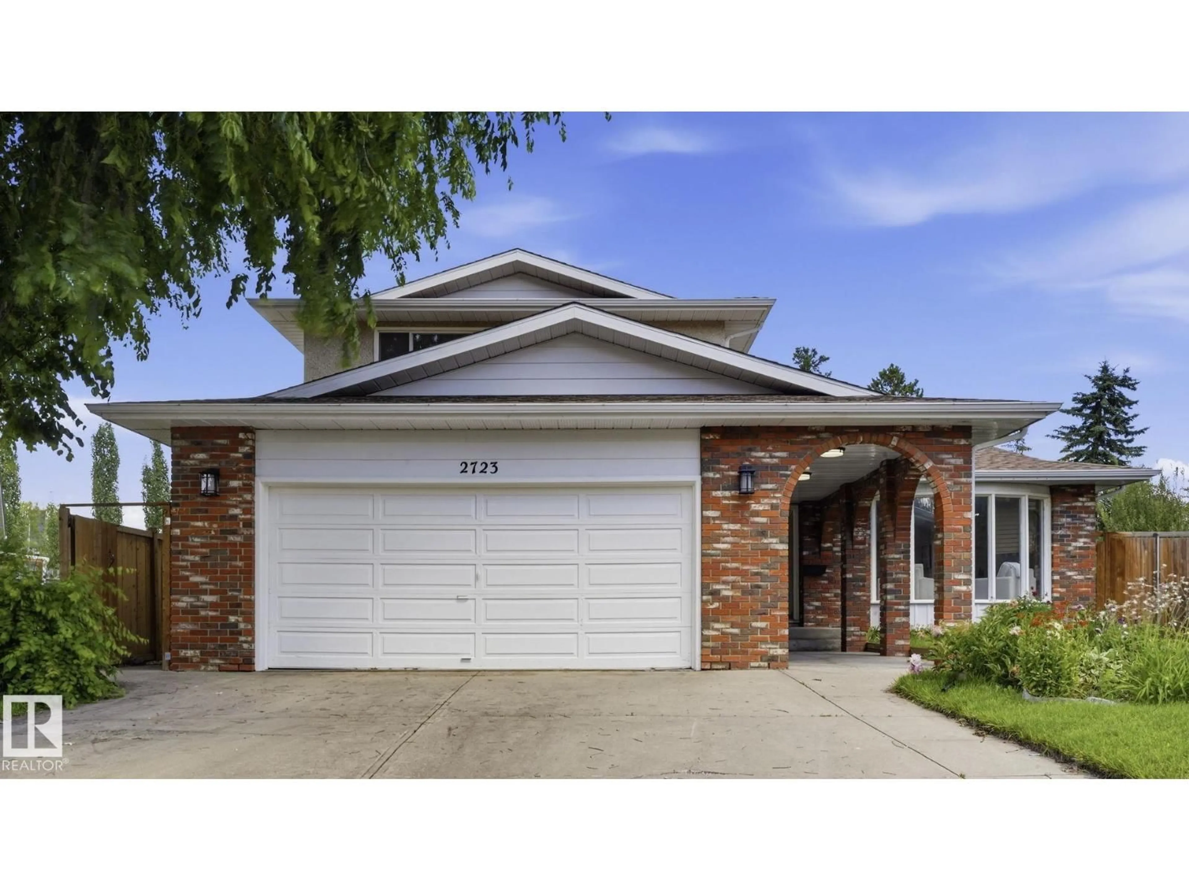 Home with vinyl exterior material, street for 2723 83 ST, Edmonton Alberta T6K3G7