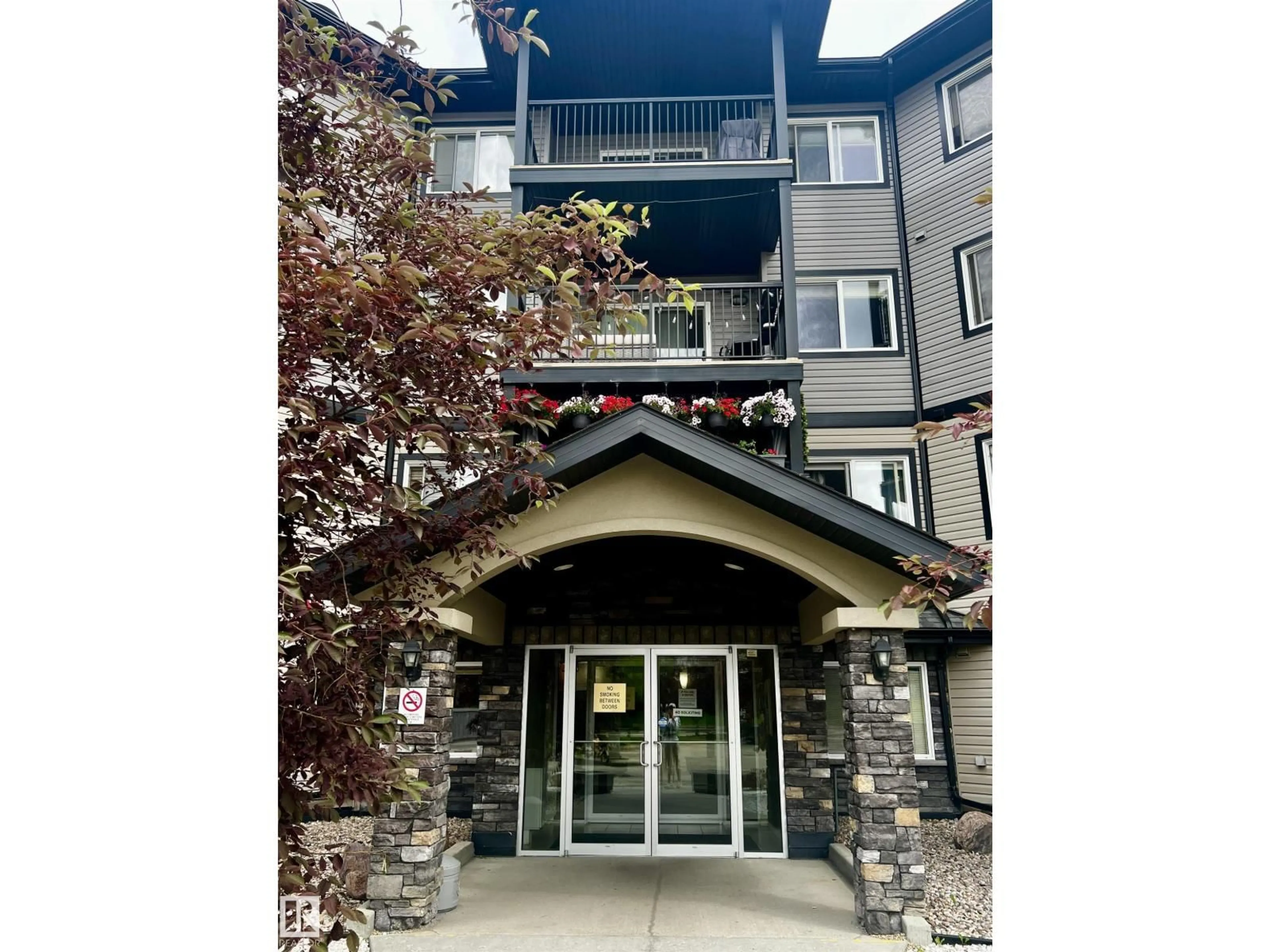 Indoor foyer for 411 - 5951 165 AV, Edmonton Alberta T5Y0J6