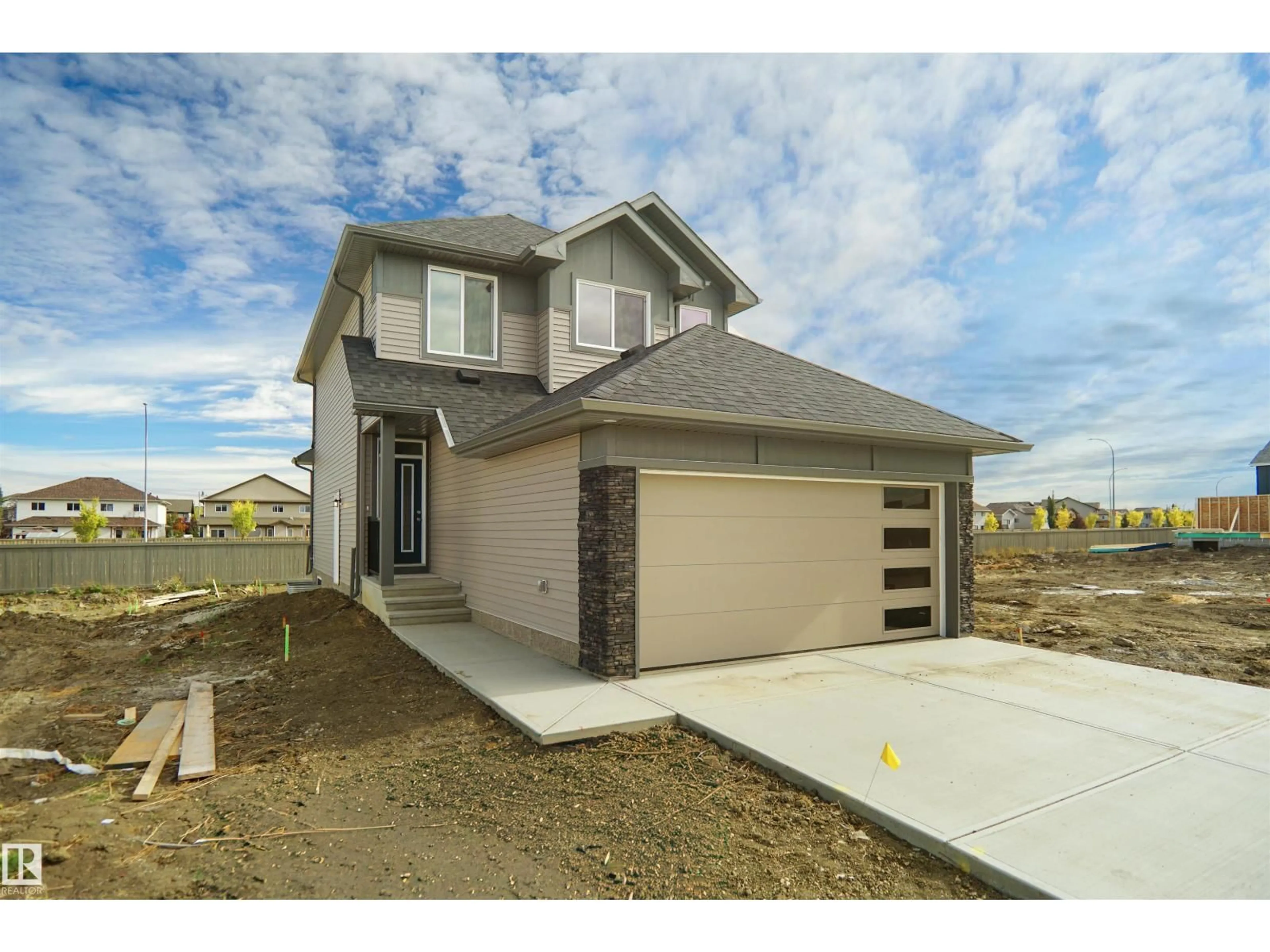 Home with brick exterior material, street for NE - 17736 7 ST, Edmonton Alberta T5Y4G2
