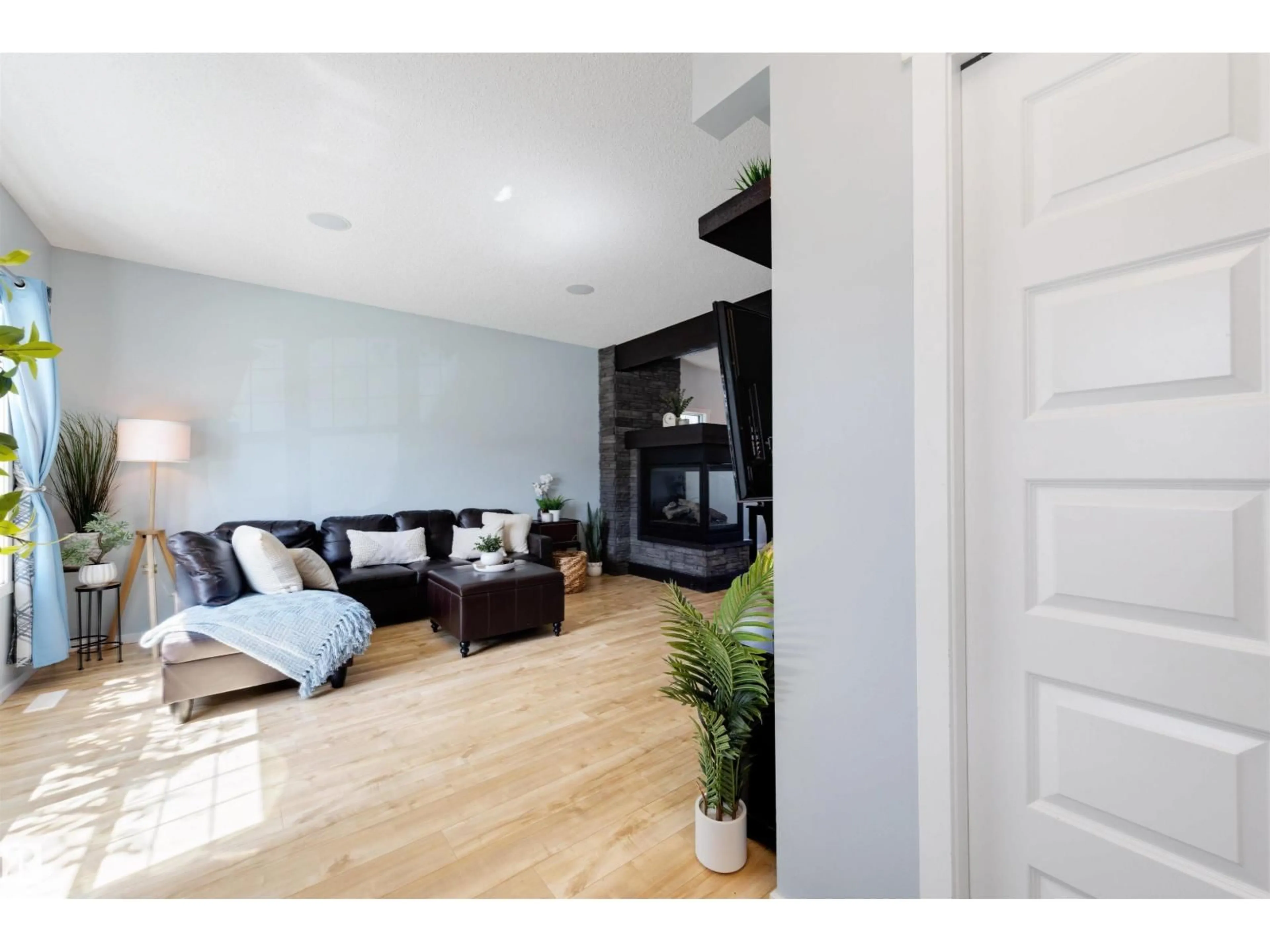 Living room with furniture, wood/laminate floor for 1522 CHAPMAN WY, Edmonton Alberta T6W0Y9