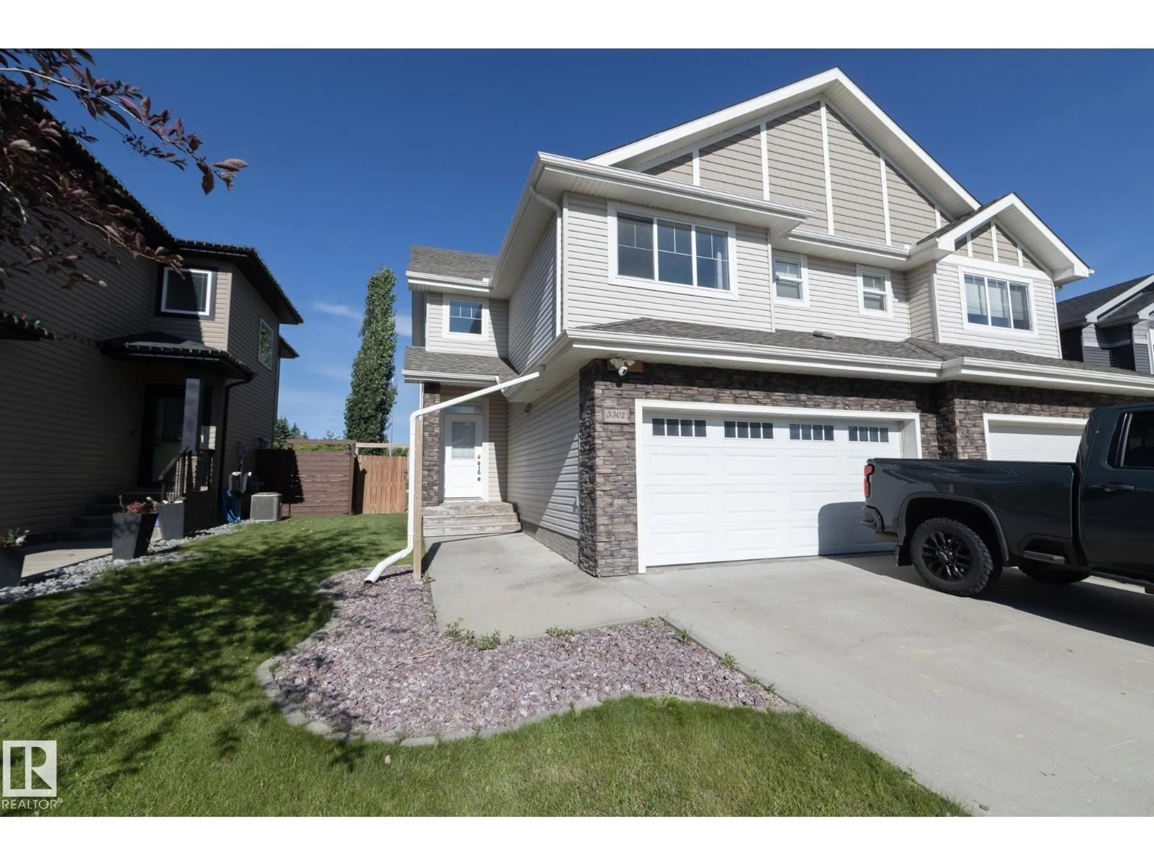 Home with vinyl exterior material, street for 3302 67 ST, Beaumont Alberta T4X0W7