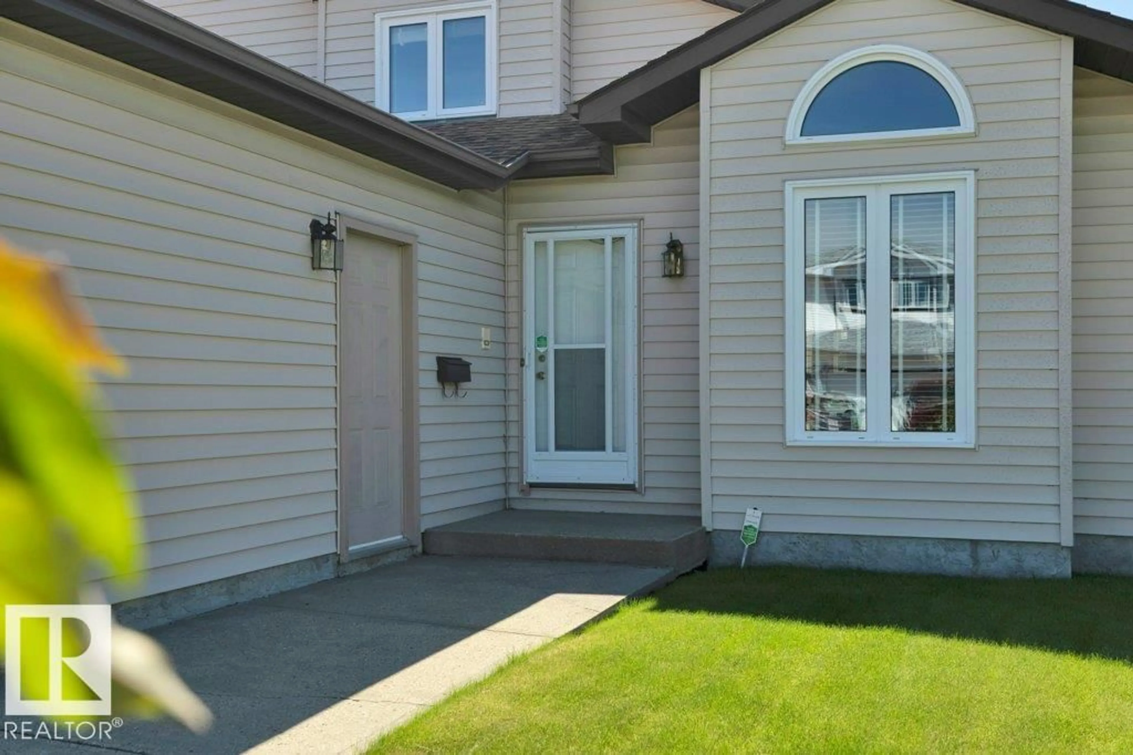 Home with vinyl exterior material, street for 10223 174 AV, Edmonton Alberta T5X5W5