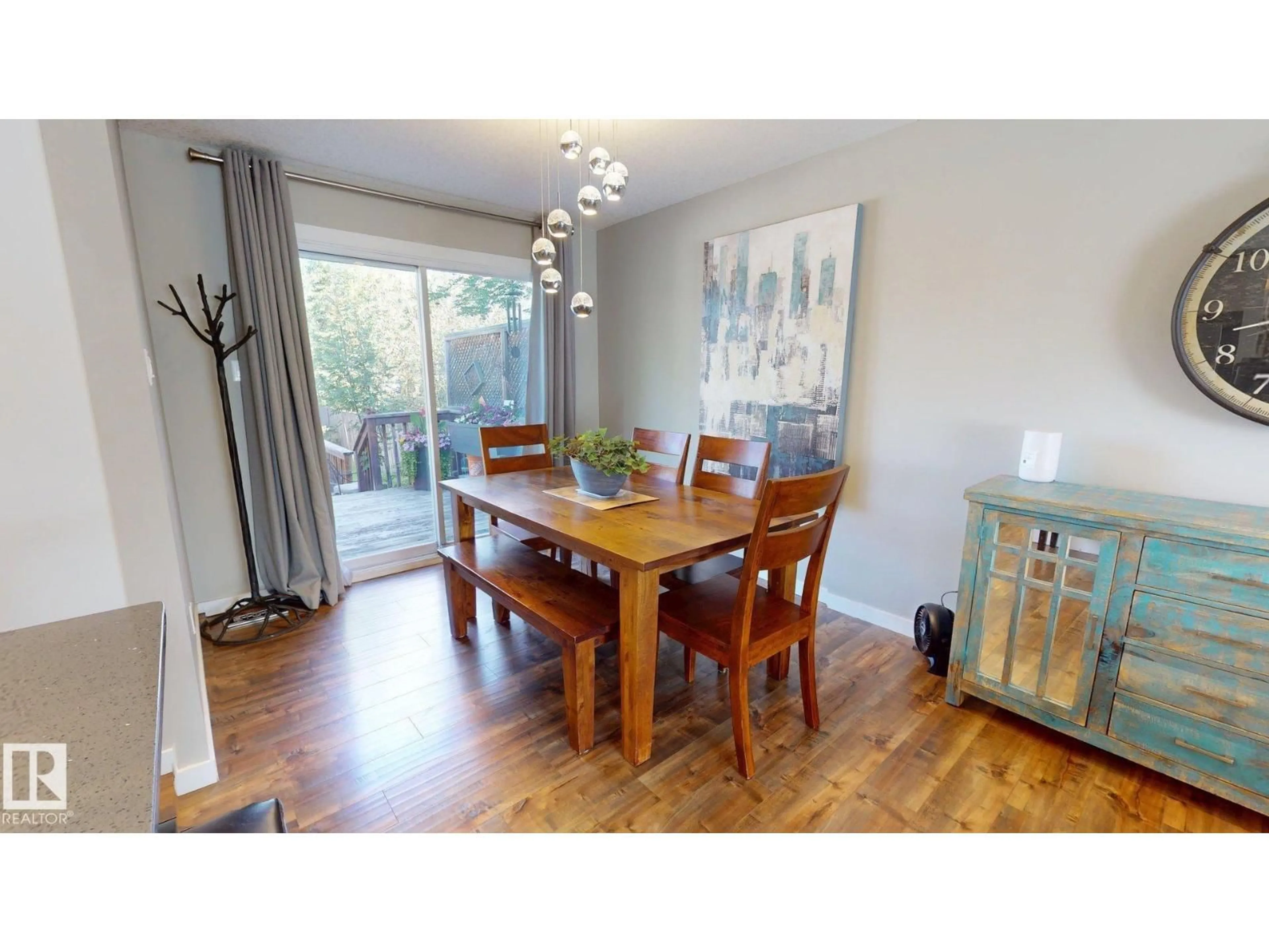 Dining room, wood/laminate floor for 1112 87 ST, Edmonton Alberta T6K1Y1