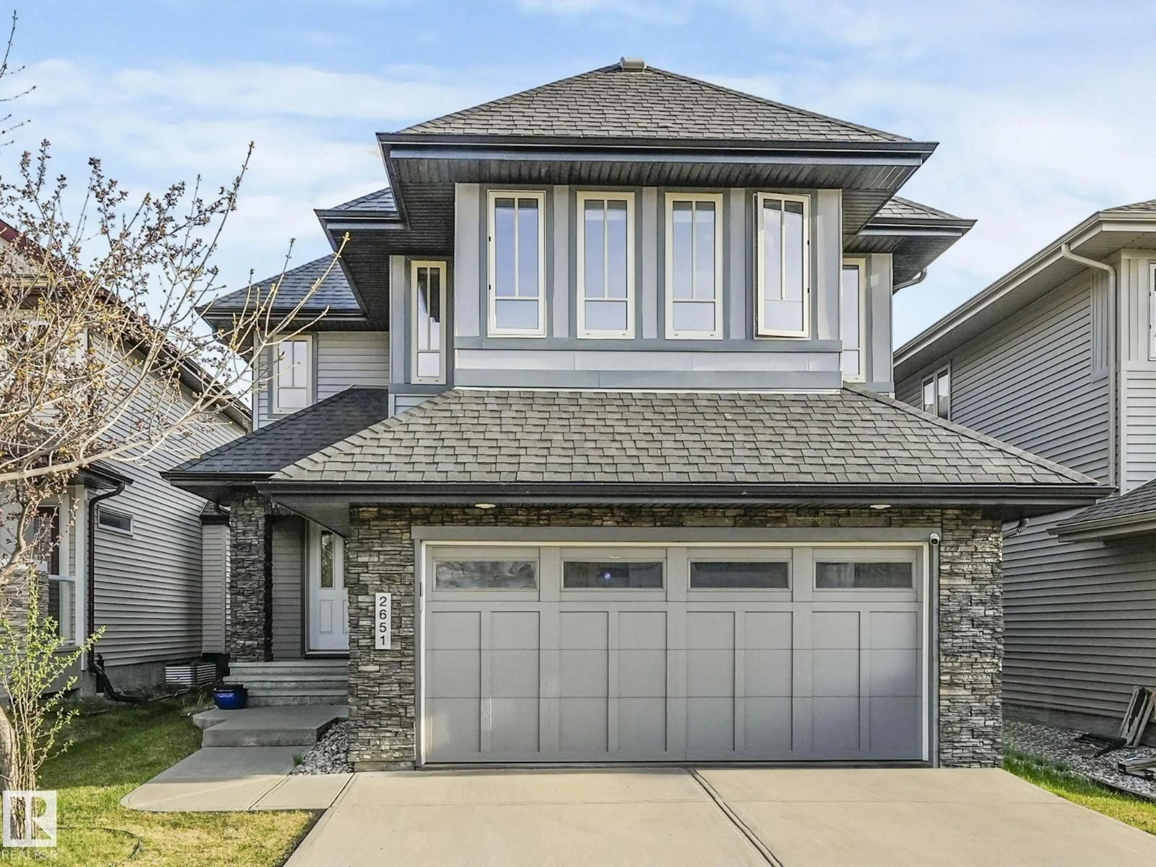 Home with vinyl exterior material, street for 2651 ANDERSON CR, Edmonton Alberta T6W0K7