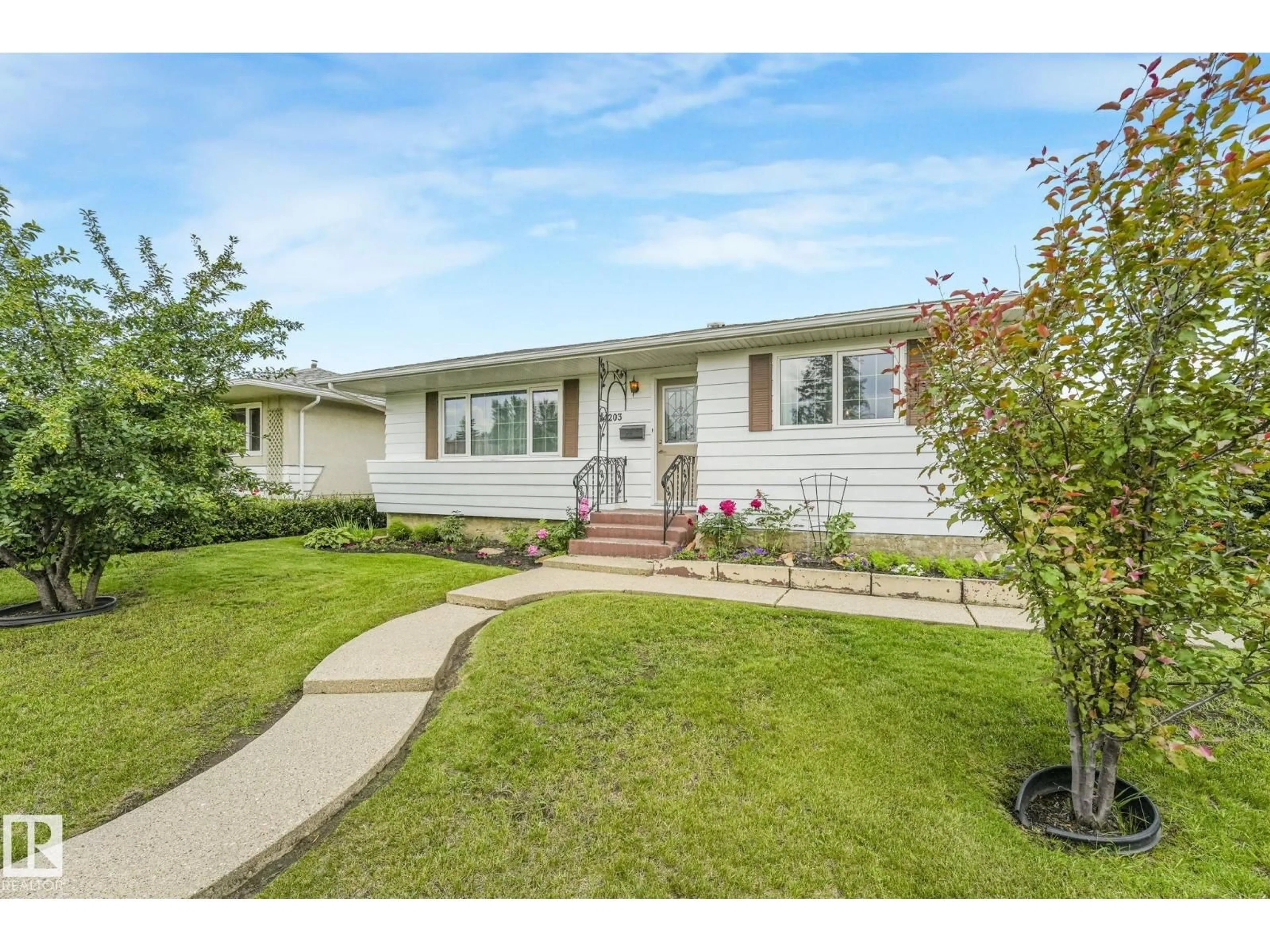Home with vinyl exterior material, street for NW - 14203 74 ST, Edmonton Alberta T5C0Y1