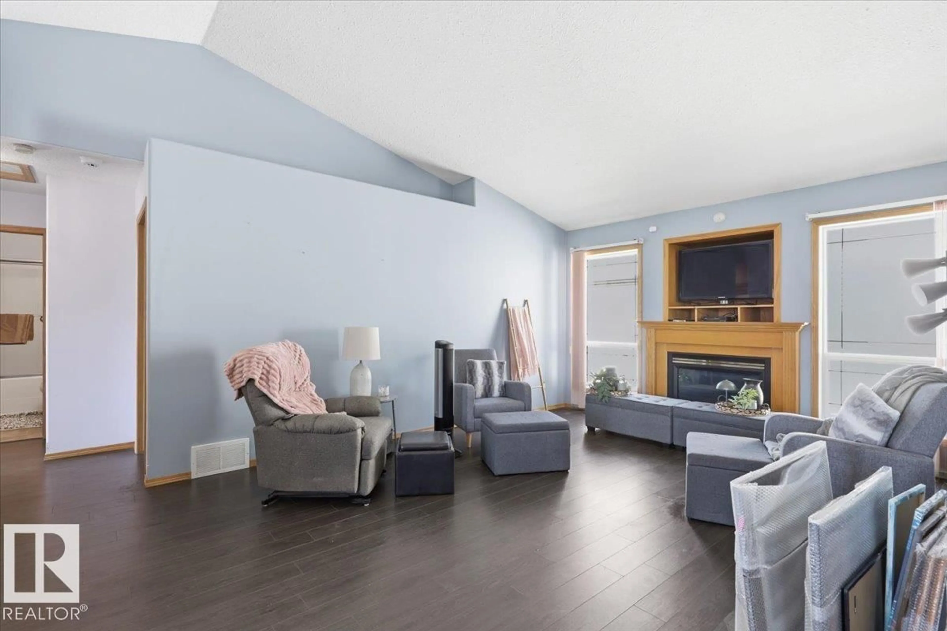 Living room with furniture, wood/laminate floor for 17 CLEARWATER CR, Wetaskiwin Alberta T9A3R4