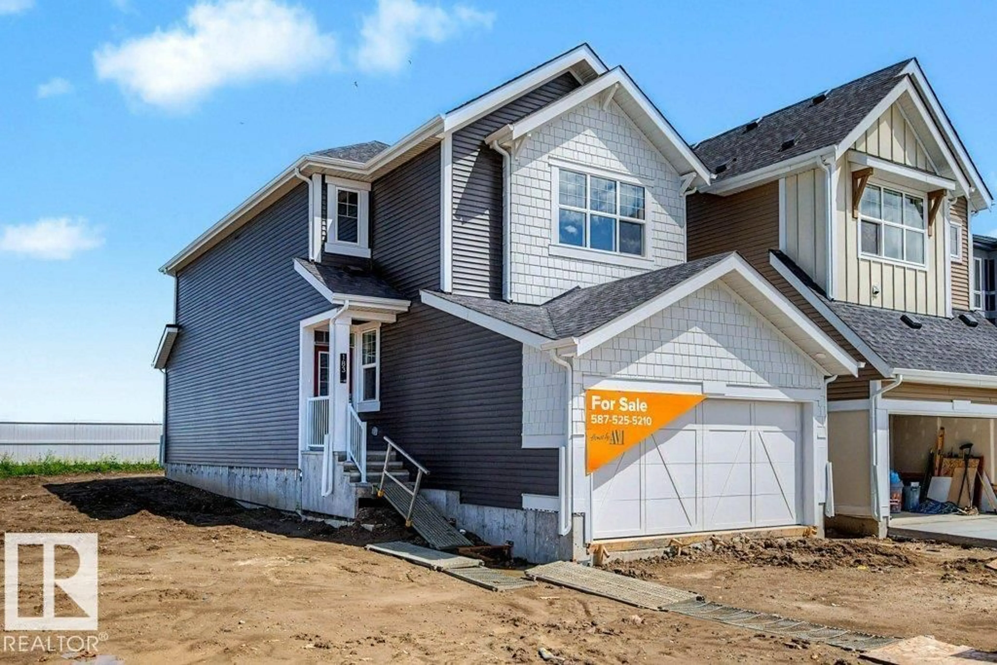Home with vinyl exterior material, street for 183 STILES BEND, Leduc Alberta T9E0Y8