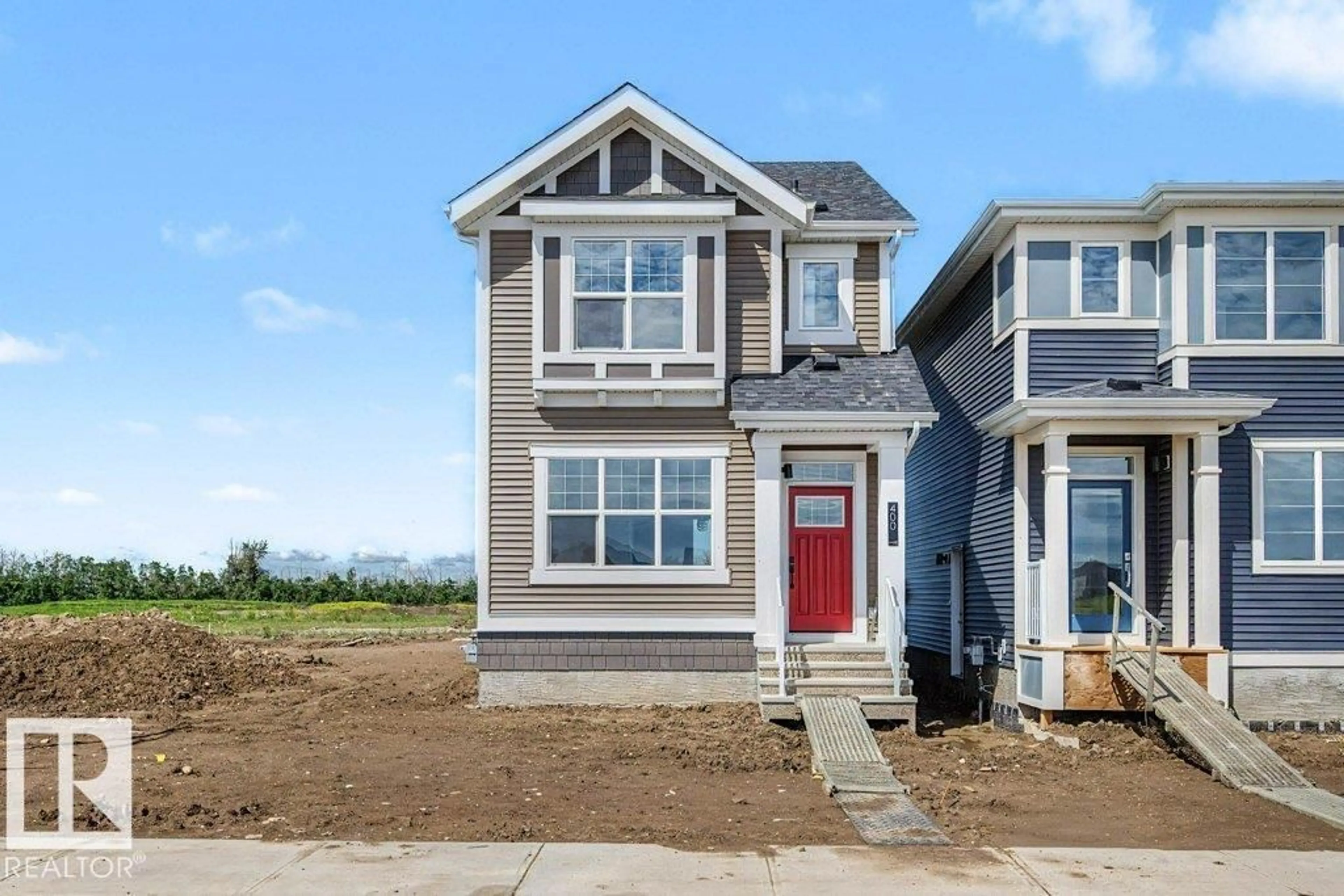 Home with vinyl exterior material, street for 400 STILES BEND, Leduc Alberta T9E0Y9