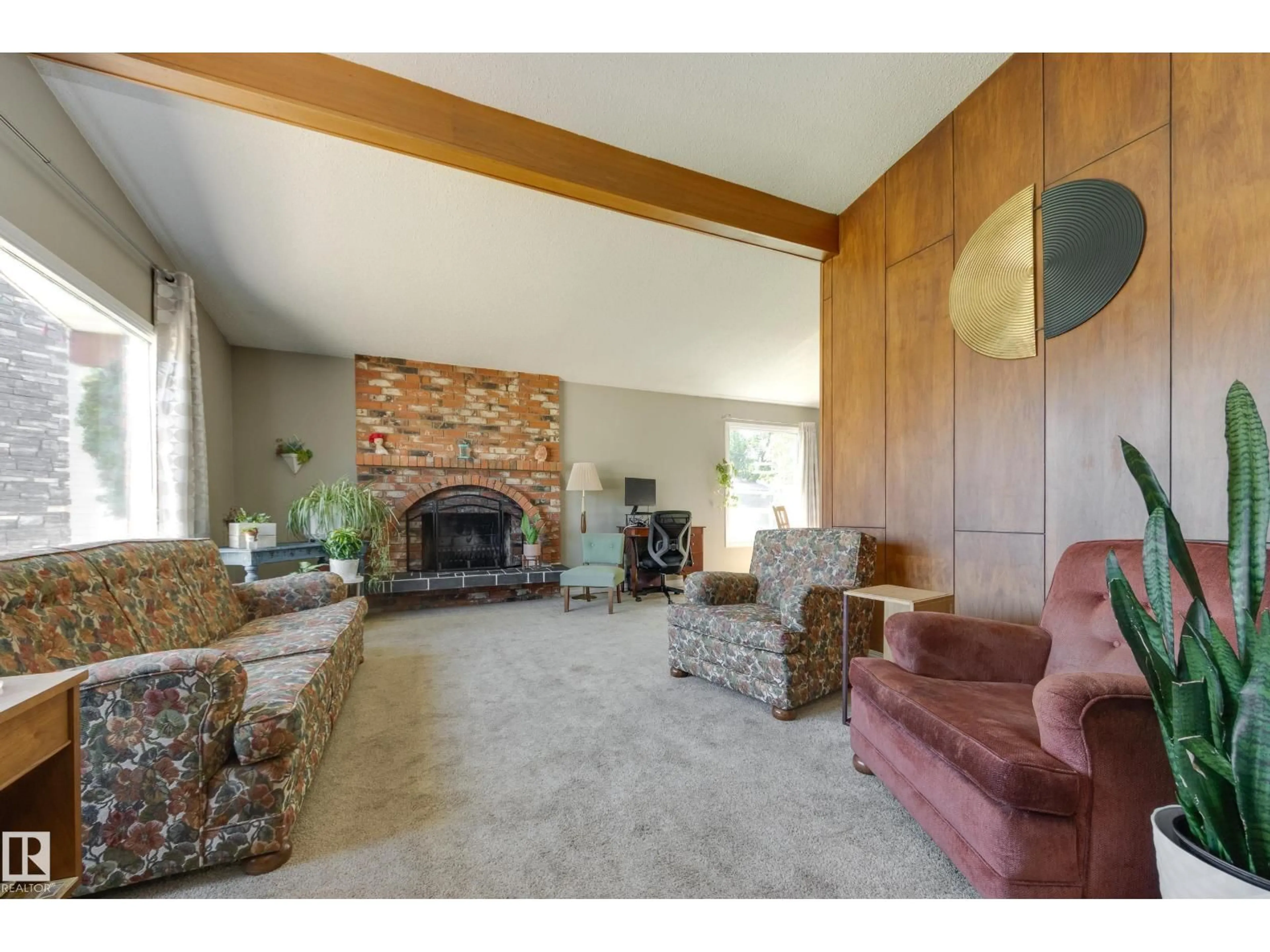 Living room with furniture, unknown for 10527 32 AV, Edmonton Alberta T6J2Y5