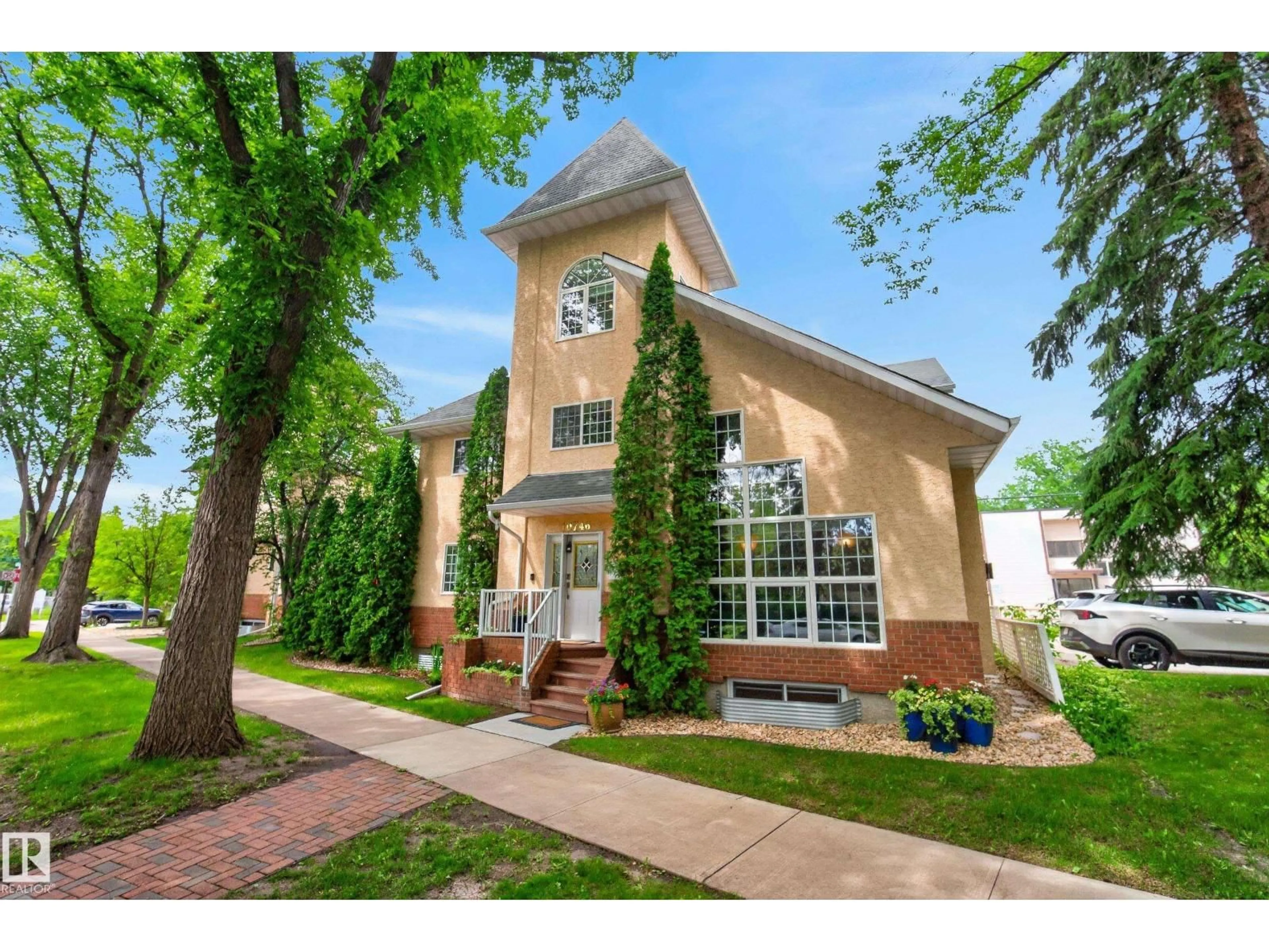 Home with brick exterior material, street for NW - 10746 UNIVERSITY AV, Edmonton Alberta T6E4P9