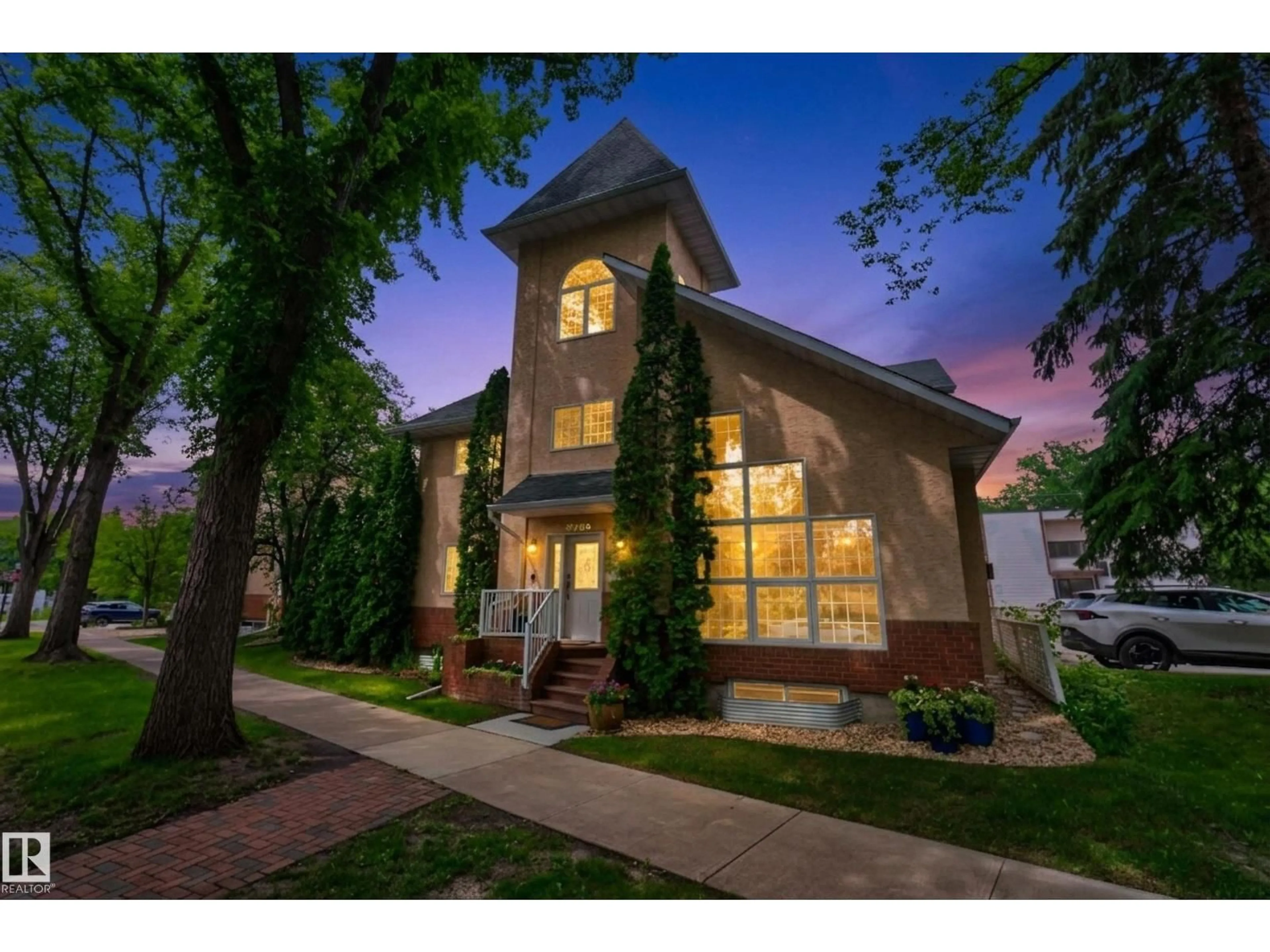 Home with brick exterior material, street for NW - 10746 UNIVERSITY AV, Edmonton Alberta T6E4P9