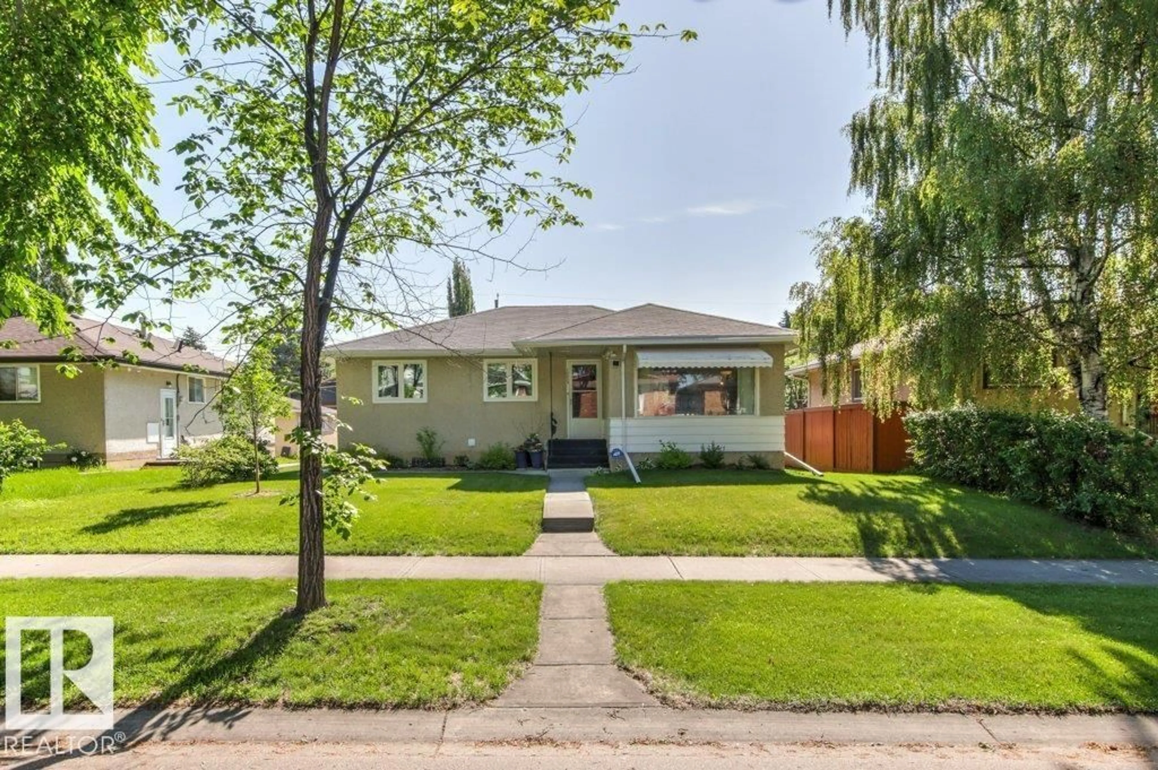 Home with brick exterior material, street for 10235 74 ST, Edmonton Alberta T6A2Y2