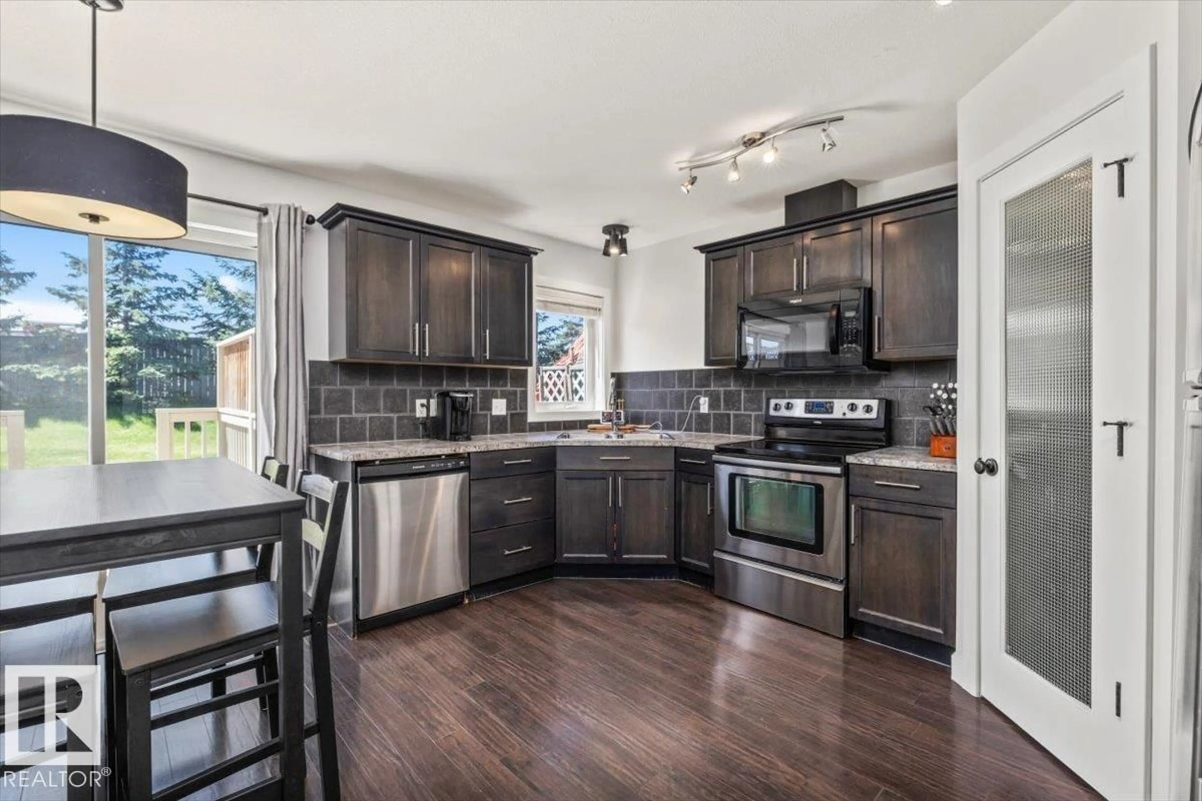Open concept kitchen, unknown for 125 BIRCHWOOD CL, Devon Alberta T9G0A5