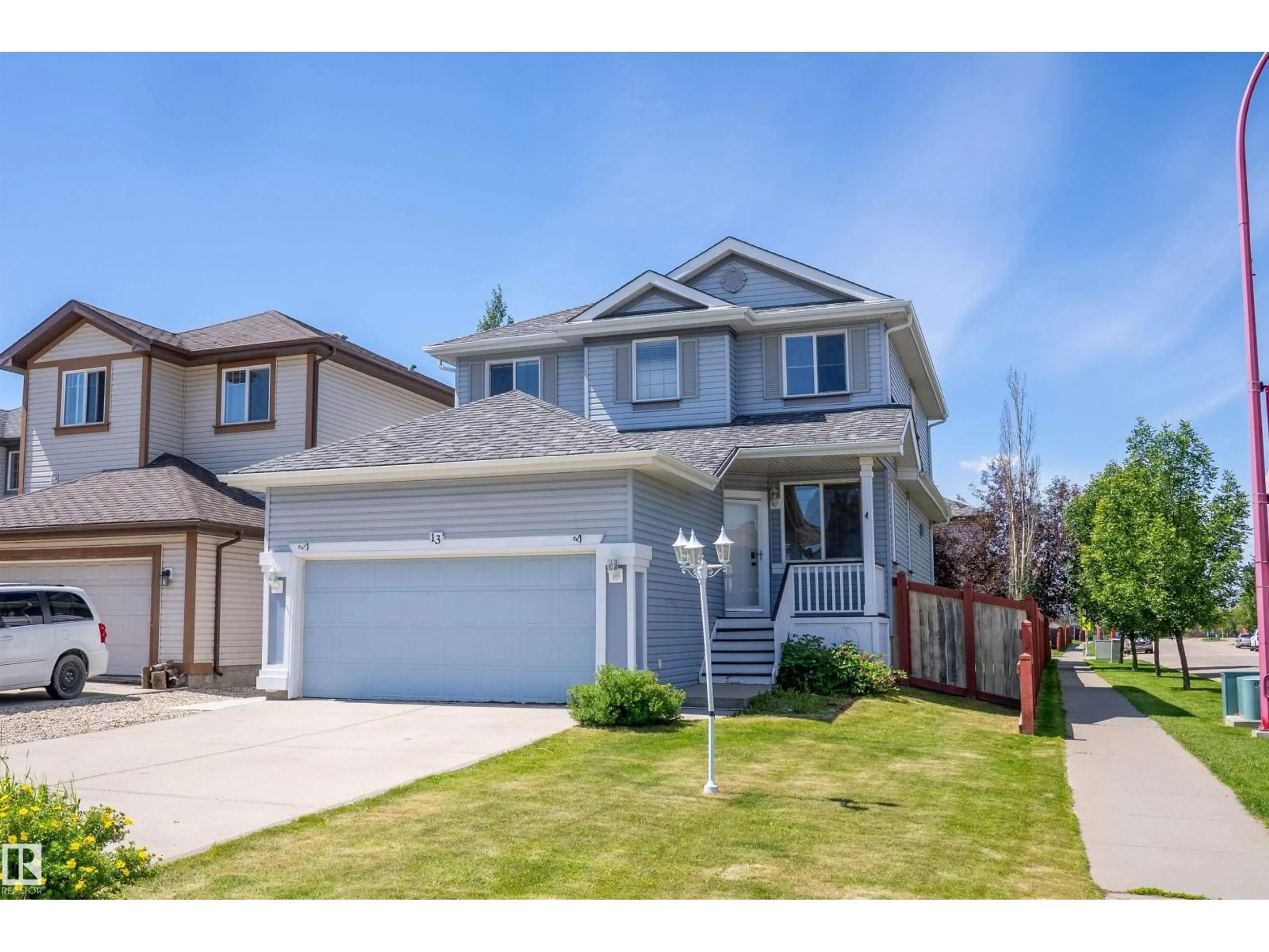 Home with vinyl exterior material, street for 13 SOUTHFORK CO, Leduc Alberta T9E0E9