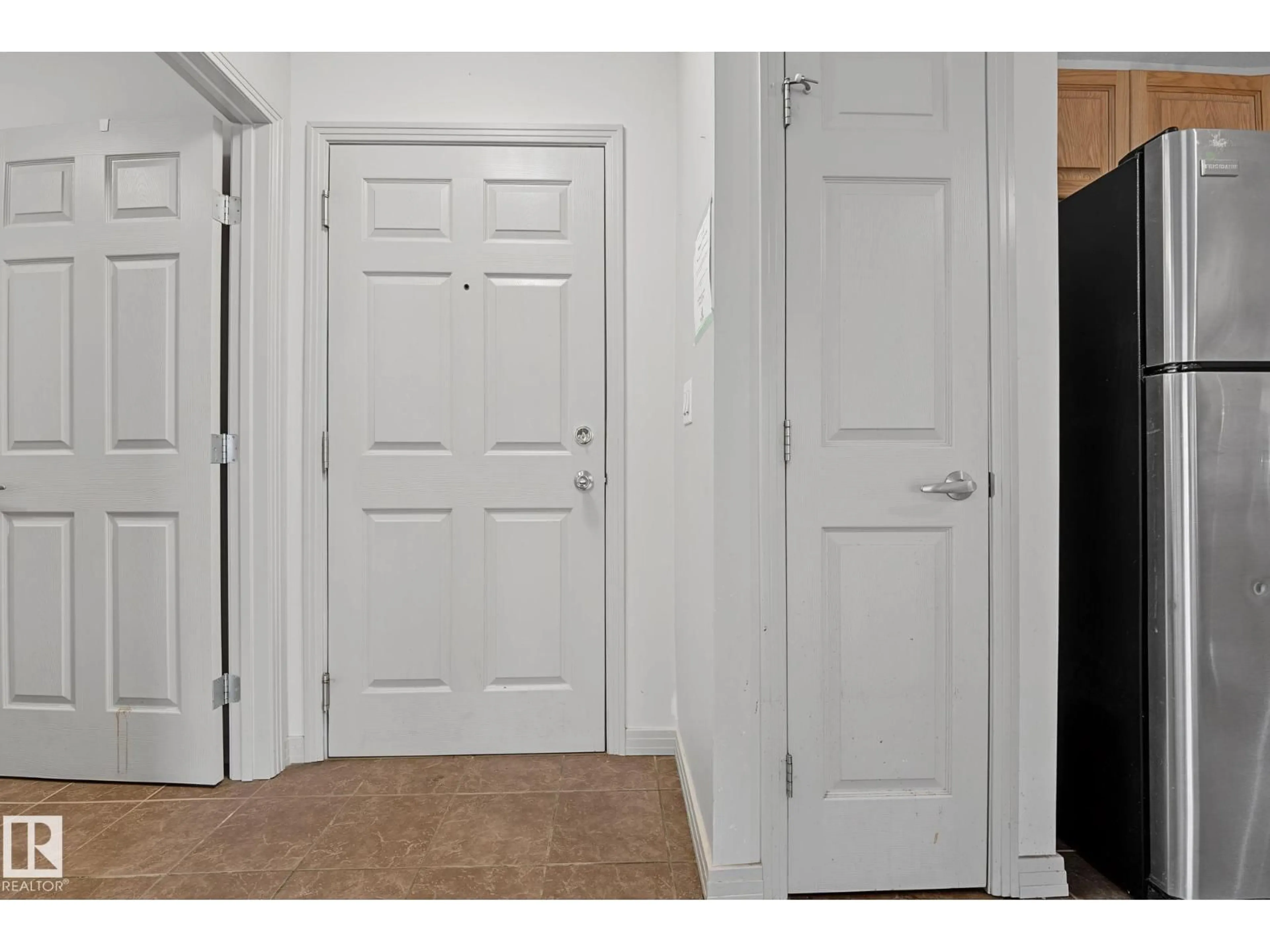 Indoor entryway for #111 - 5005 165 AV, Edmonton Alberta T5Y0L8