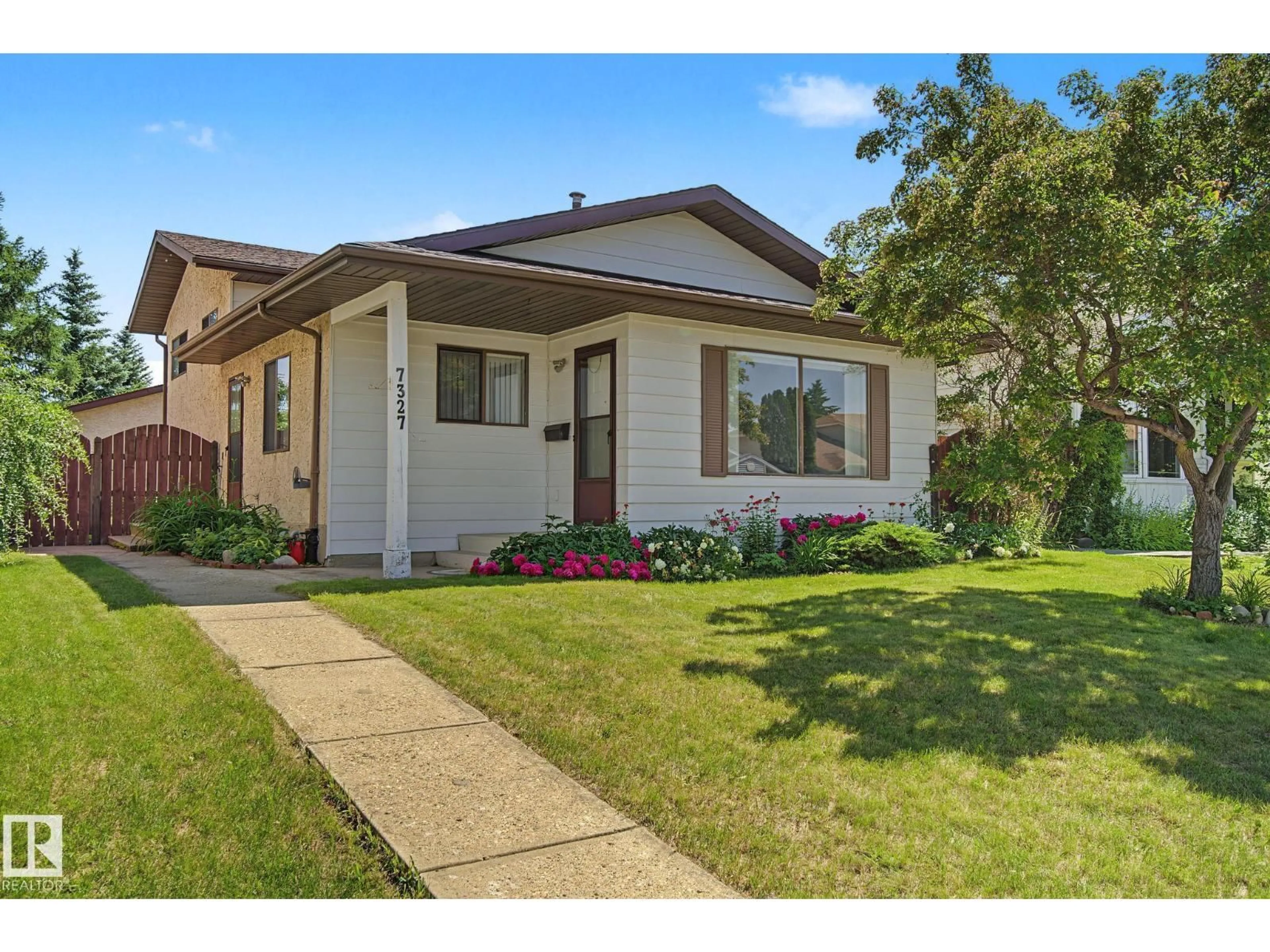 Home with vinyl exterior material, street for NW - 7327 189 ST, Edmonton Alberta T5T5G7