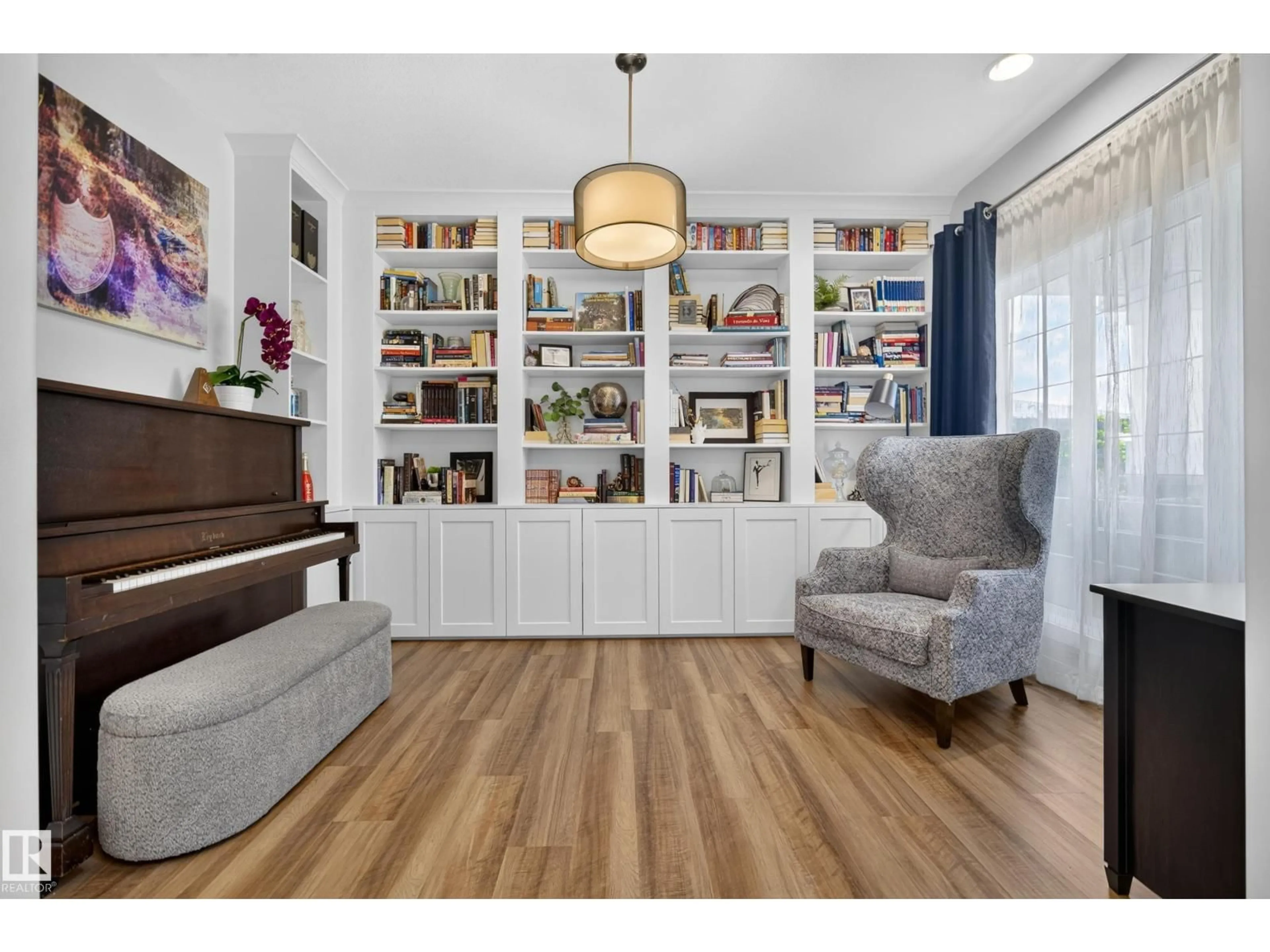 Living room with furniture, wood/laminate floor for 3256 WINSPEAR CR, Edmonton Alberta T6X1P2