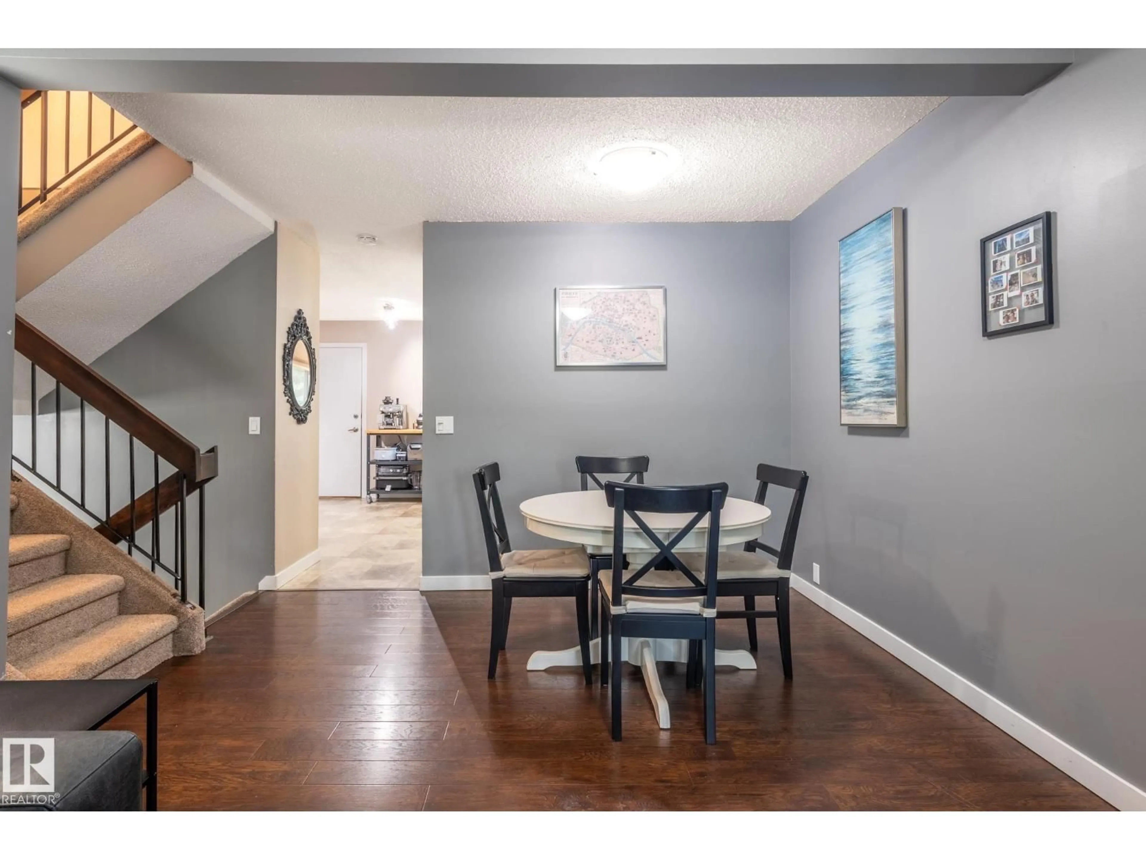 Dining room, wood/laminate floor for 100 FOREST GV, St. Albert Alberta T8N3K6