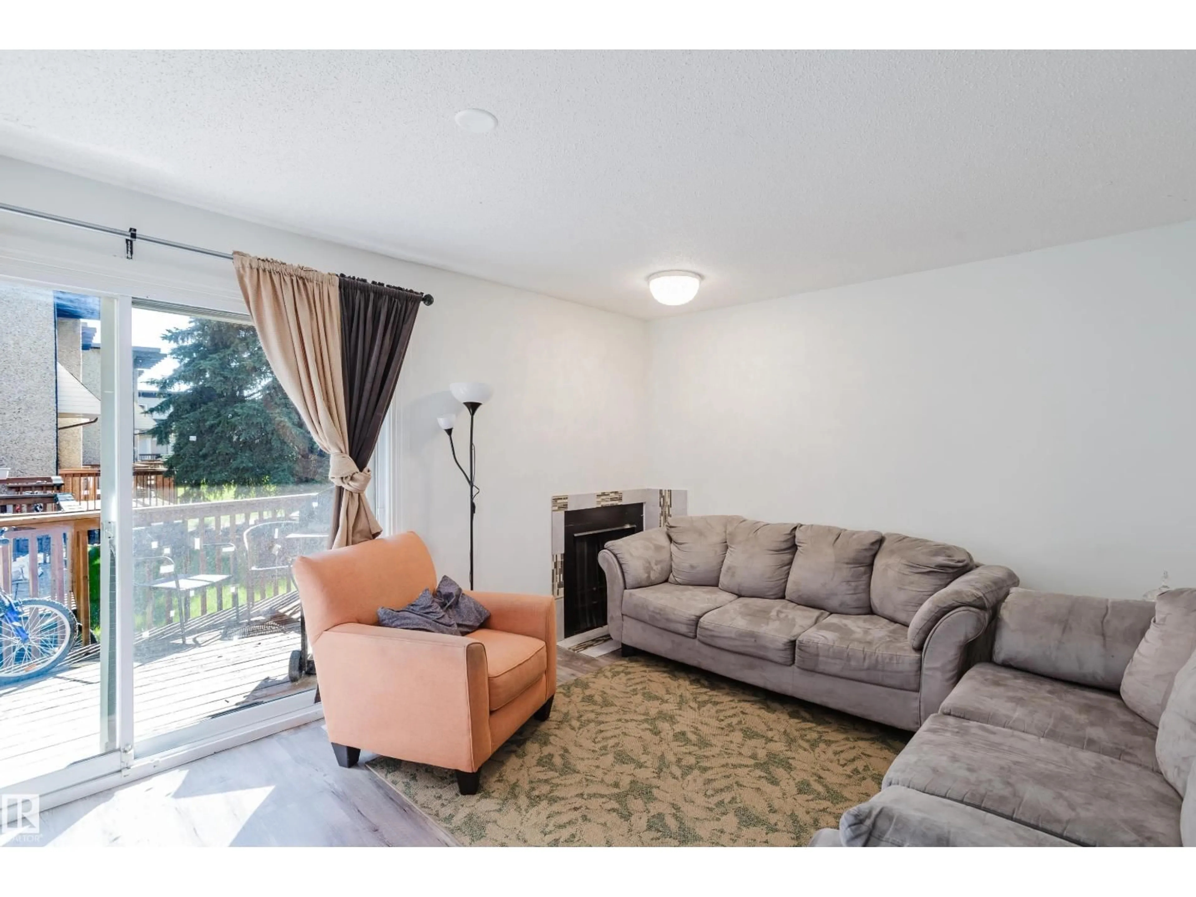 Living room with furniture, unknown for NW - 14610 121 ST, Edmonton Alberta T5X1T8