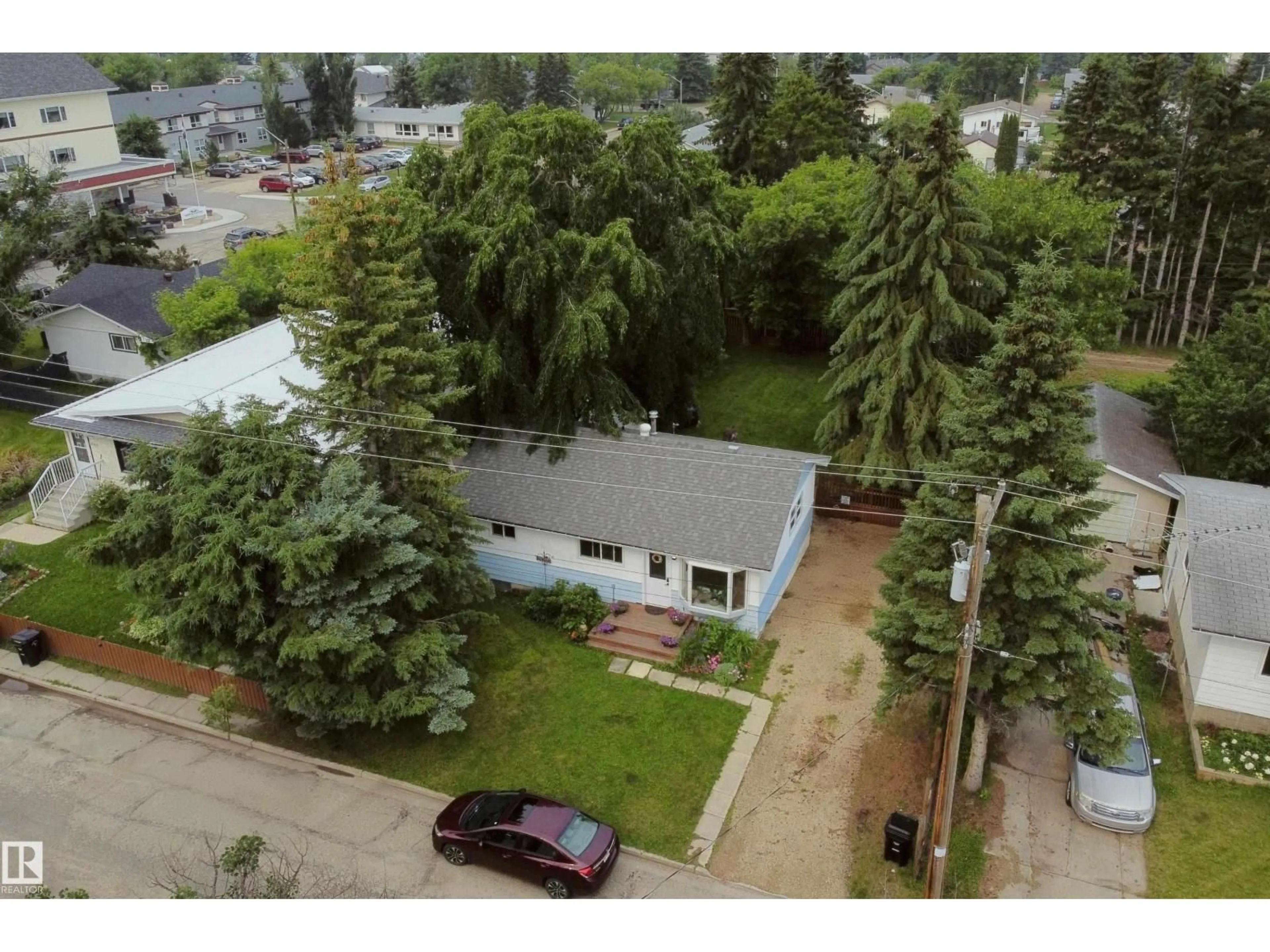 A pic from outside/outdoor area/front of a property/back of a property/a pic from drone, street for 5212 43 STREET, Barrhead Alberta T7N1J7