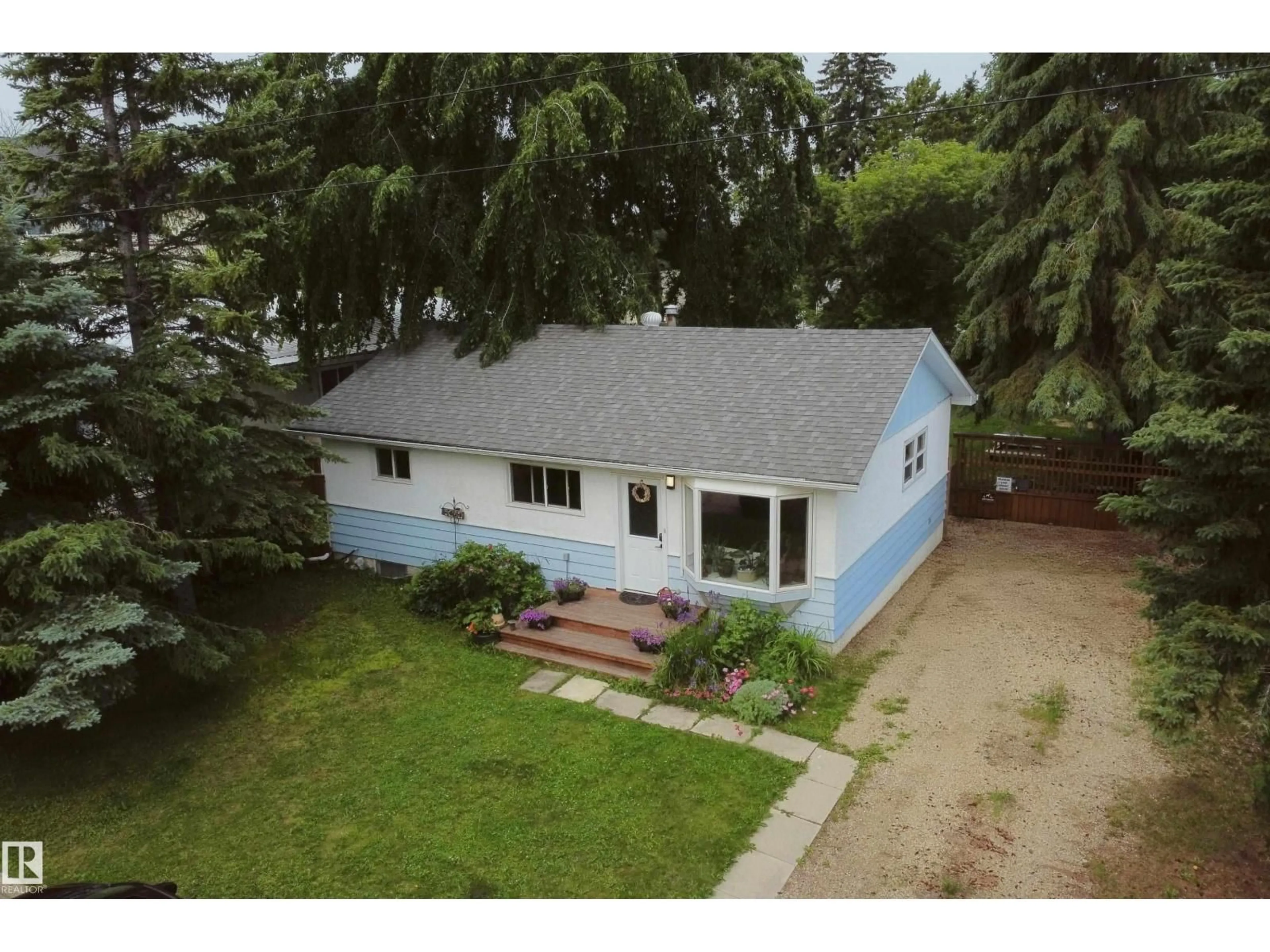 A pic from outside/outdoor area/front of a property/back of a property/a pic from drone, street for 5212 43 STREET, Barrhead Alberta T7N1J7