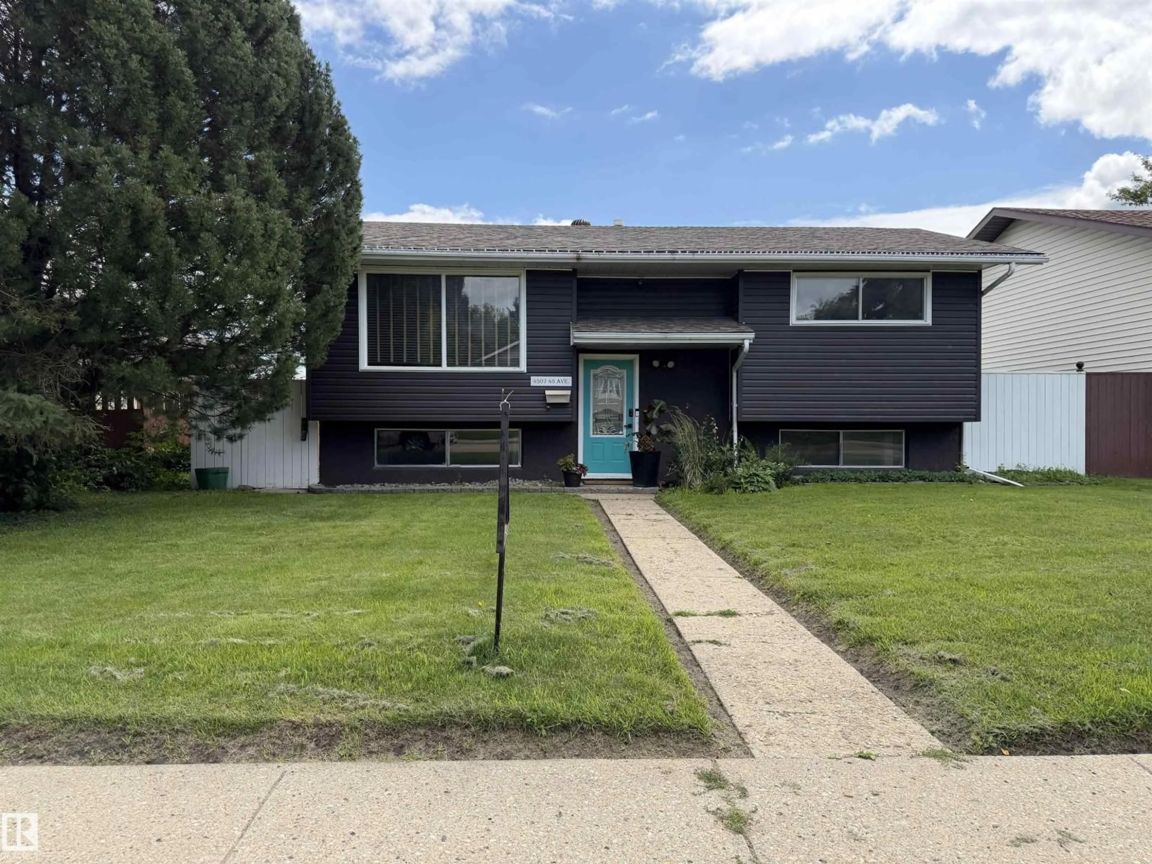 Home with vinyl exterior material, street for 4507 46 AV, Wetaskiwin Alberta T9A1X1