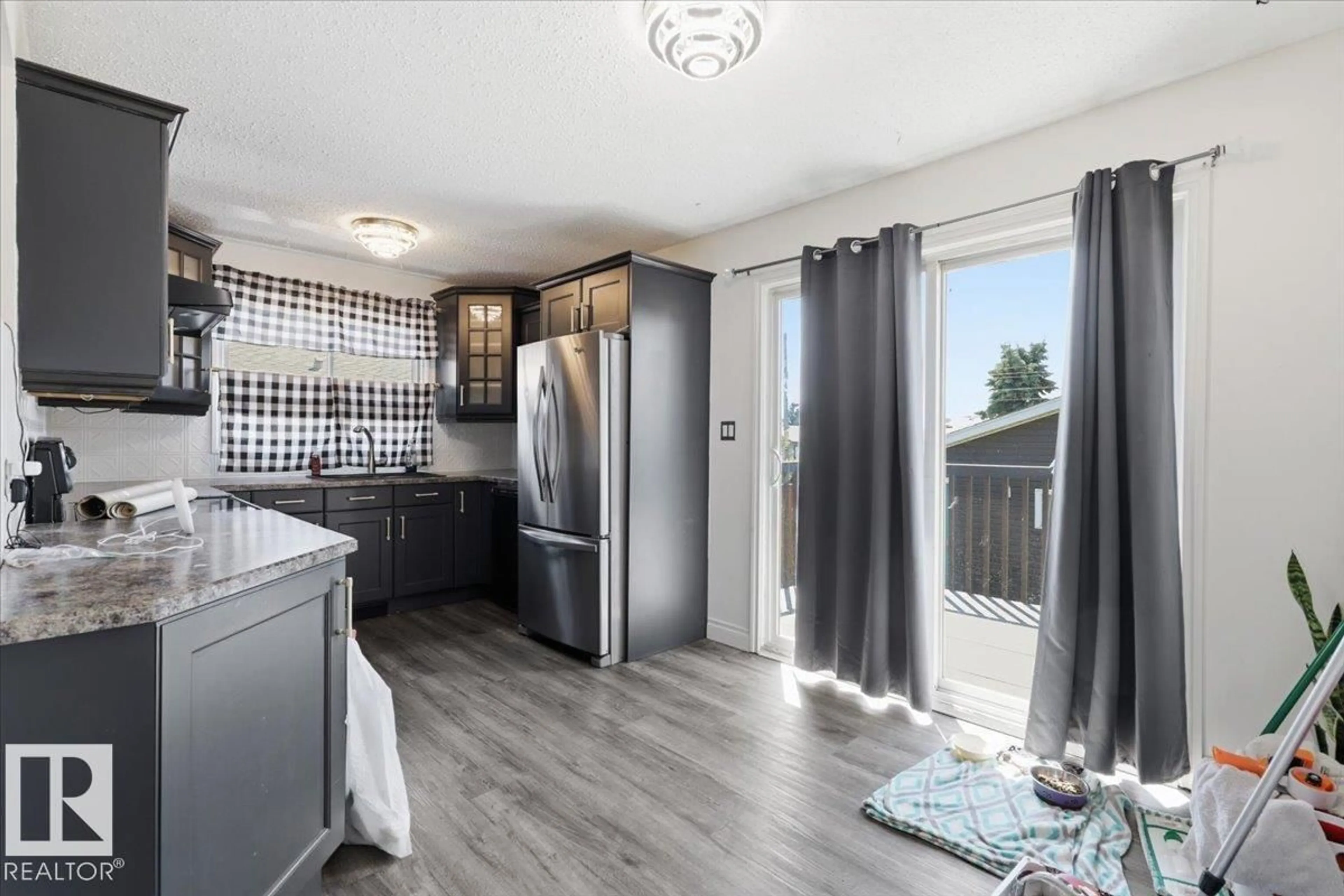 Open concept kitchen, unknown for 4507 46 AV, Wetaskiwin Alberta T9A1X1