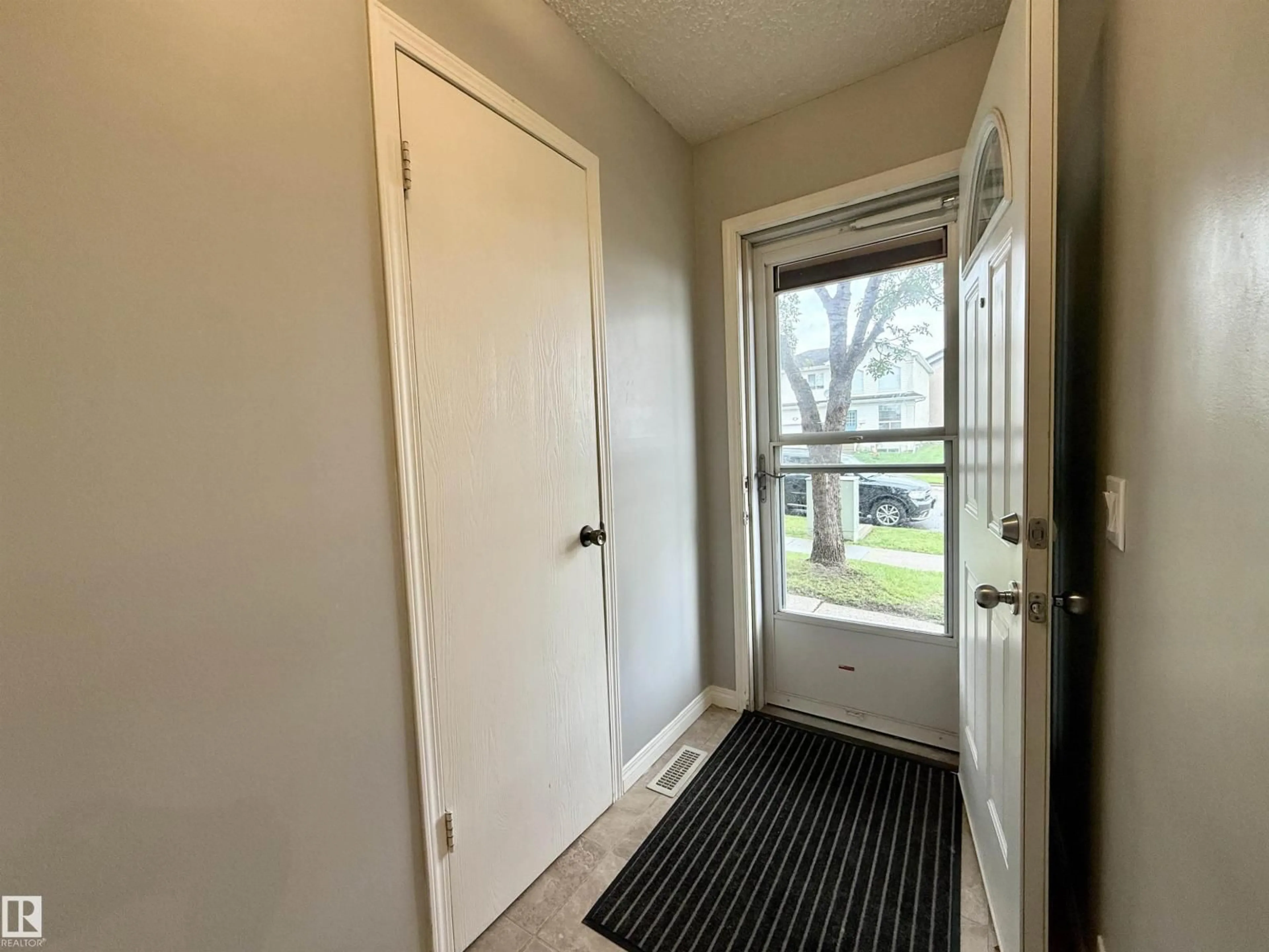 Home with vinyl exterior material, street for 5107 146 AV, Edmonton Alberta T5A4M7