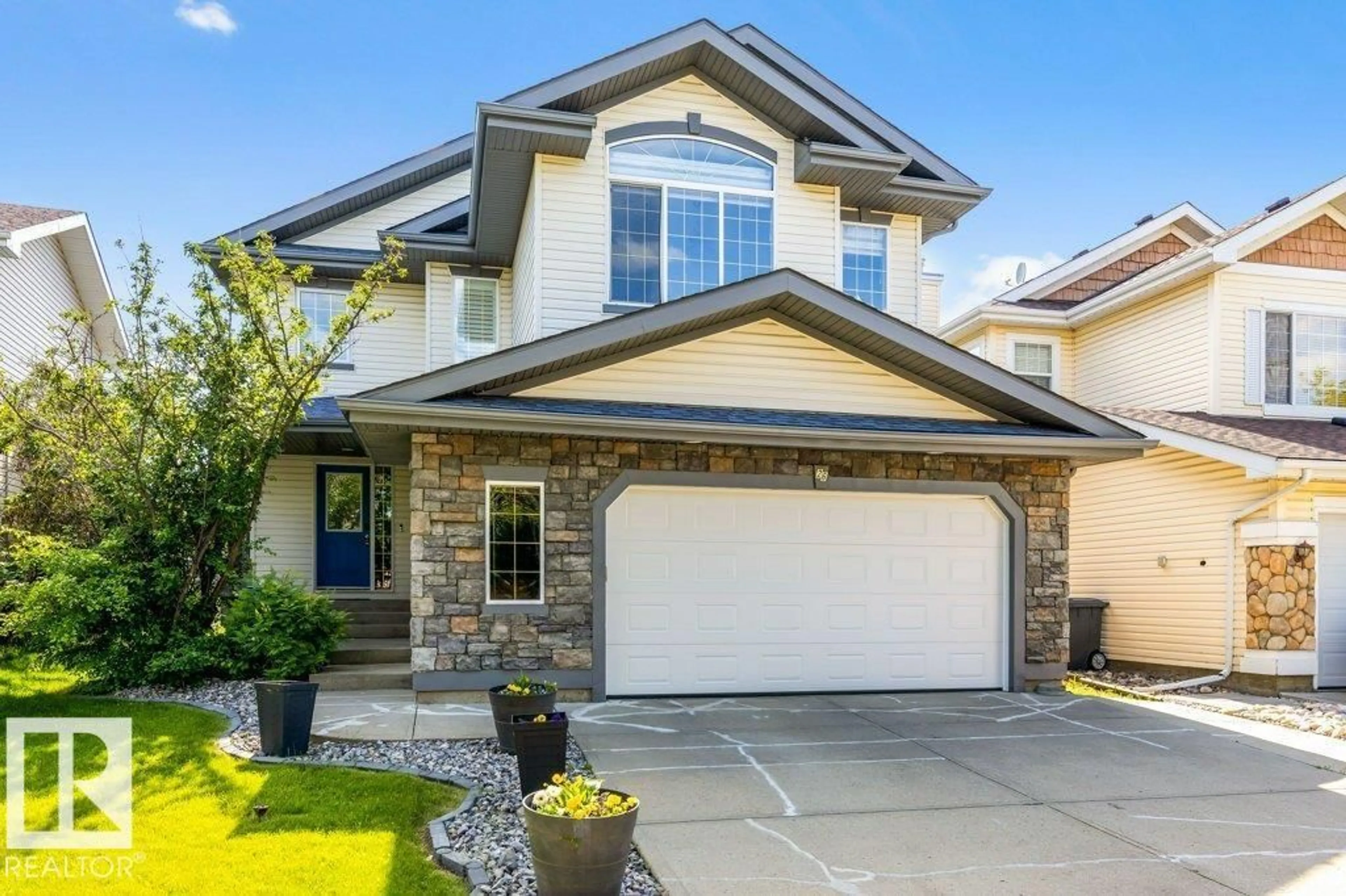 Home with vinyl exterior material, street for 26 NORTH RIDGE DR, St. Albert Alberta T8N7E4