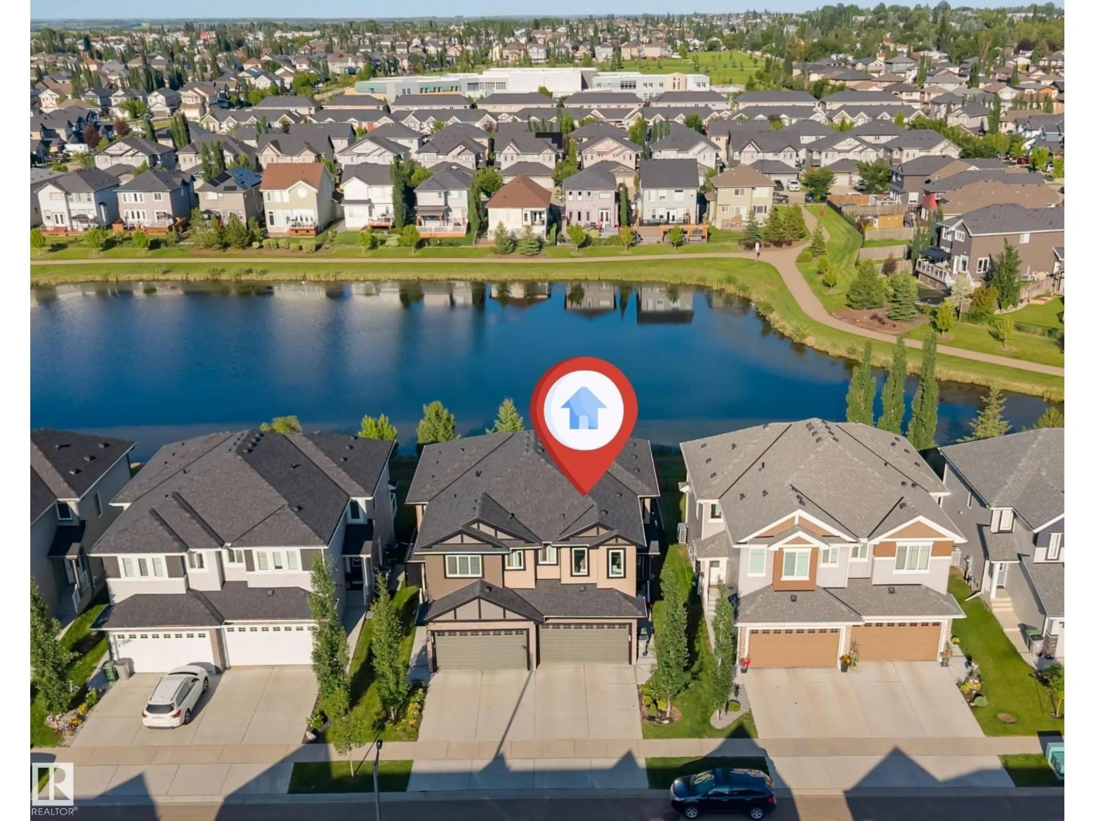 A pic from outside/outdoor area/front of a property/back of a property/a pic from drone, water/lake/river/ocean view for 5809 65 ST, Beaumont Alberta T4X2A4