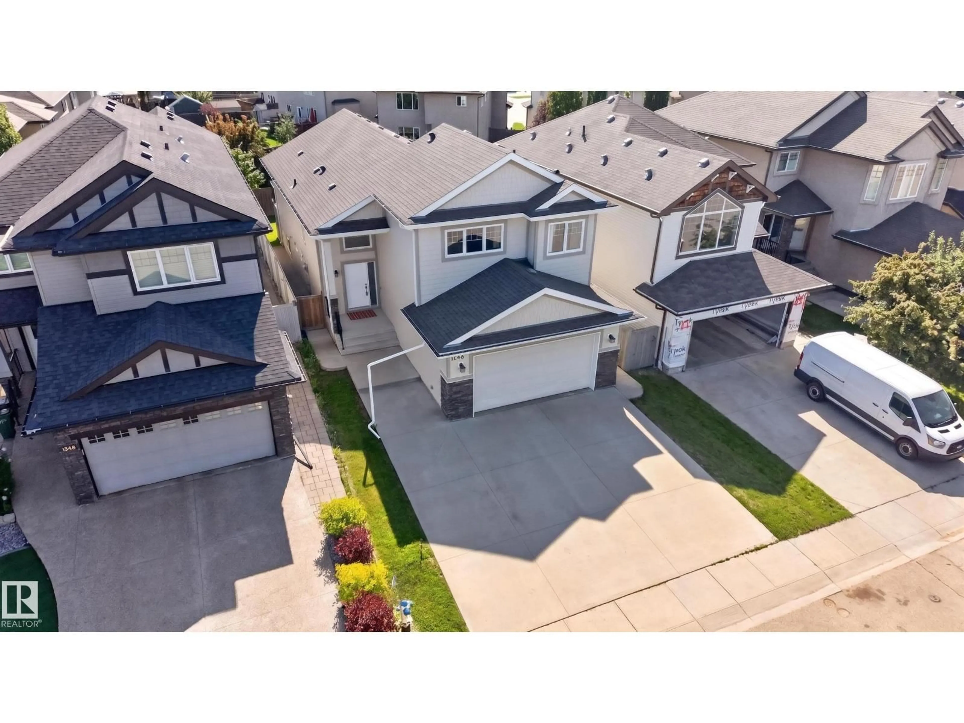 A pic from outside/outdoor area/front of a property/back of a property/a pic from drone, street for 1346 CUNNINGHAM DR, Edmonton Alberta T6W0R8