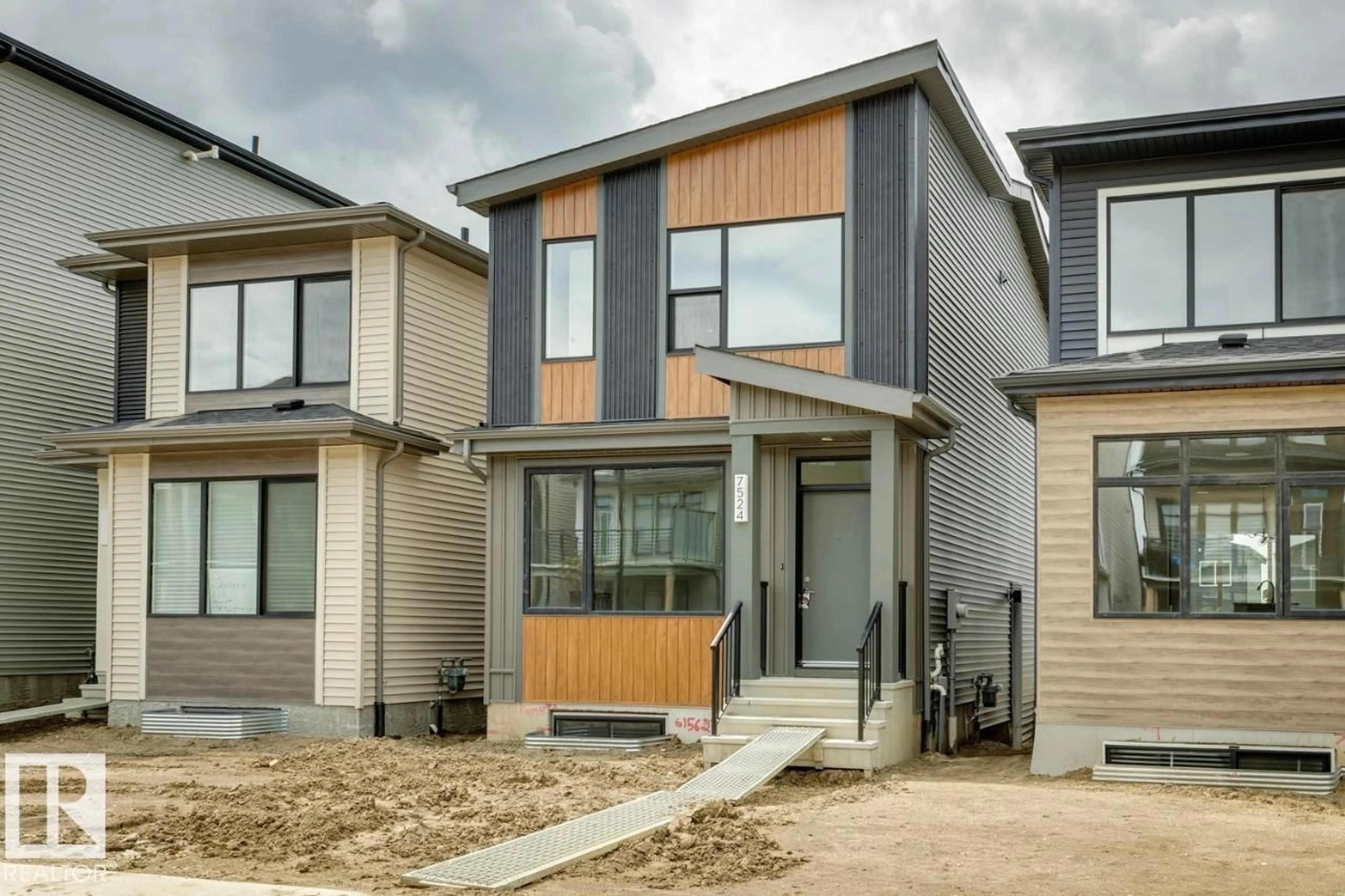 Home with vinyl exterior material, street for LI SW - 7524 KLAPSTEIN LINK, Edmonton Alberta T6W5S7