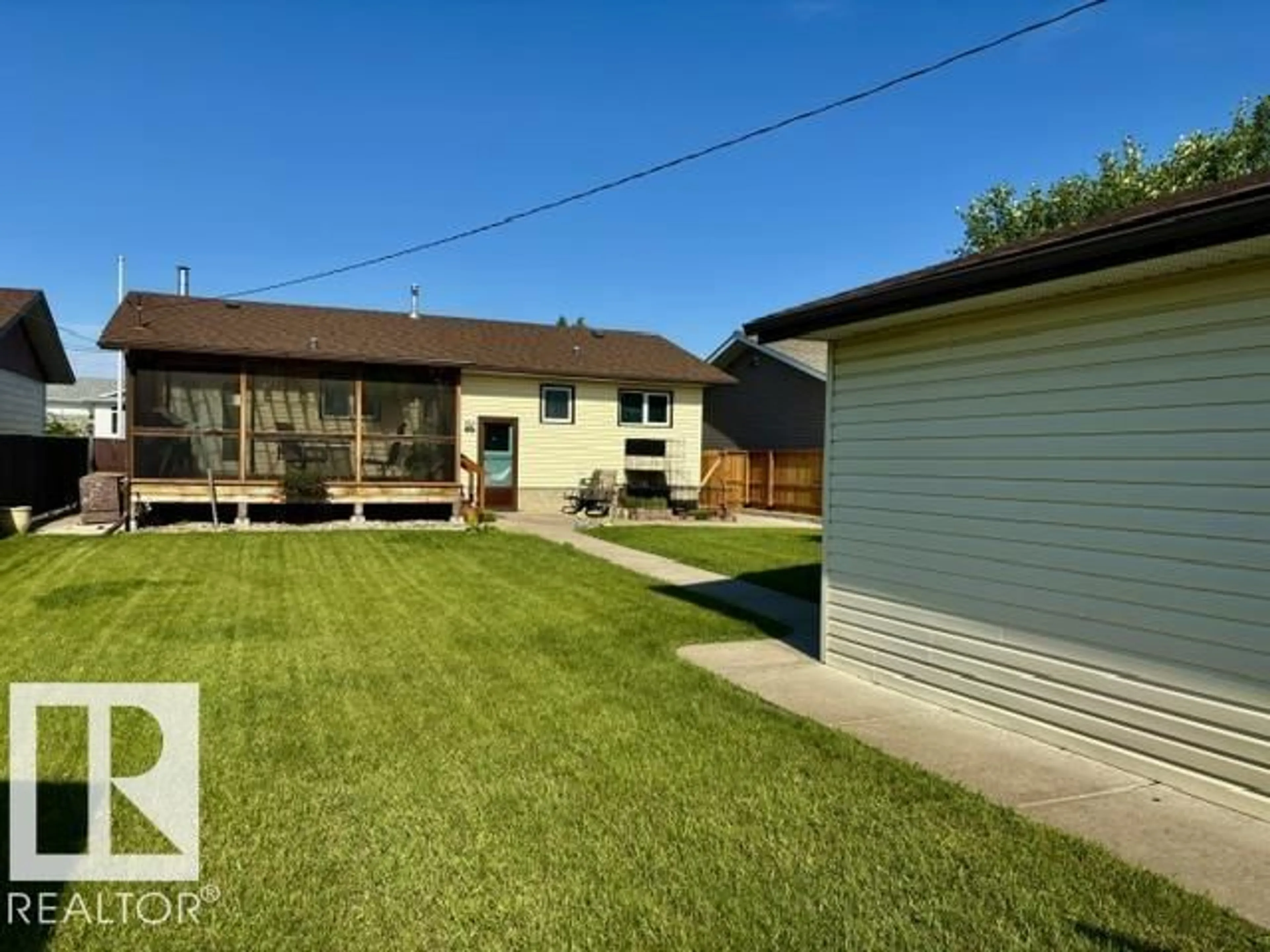 A pic from outside/outdoor area/front of a property/back of a property/a pic from drone, street for 5817 52 ST, Vegreville Alberta T9C1J2