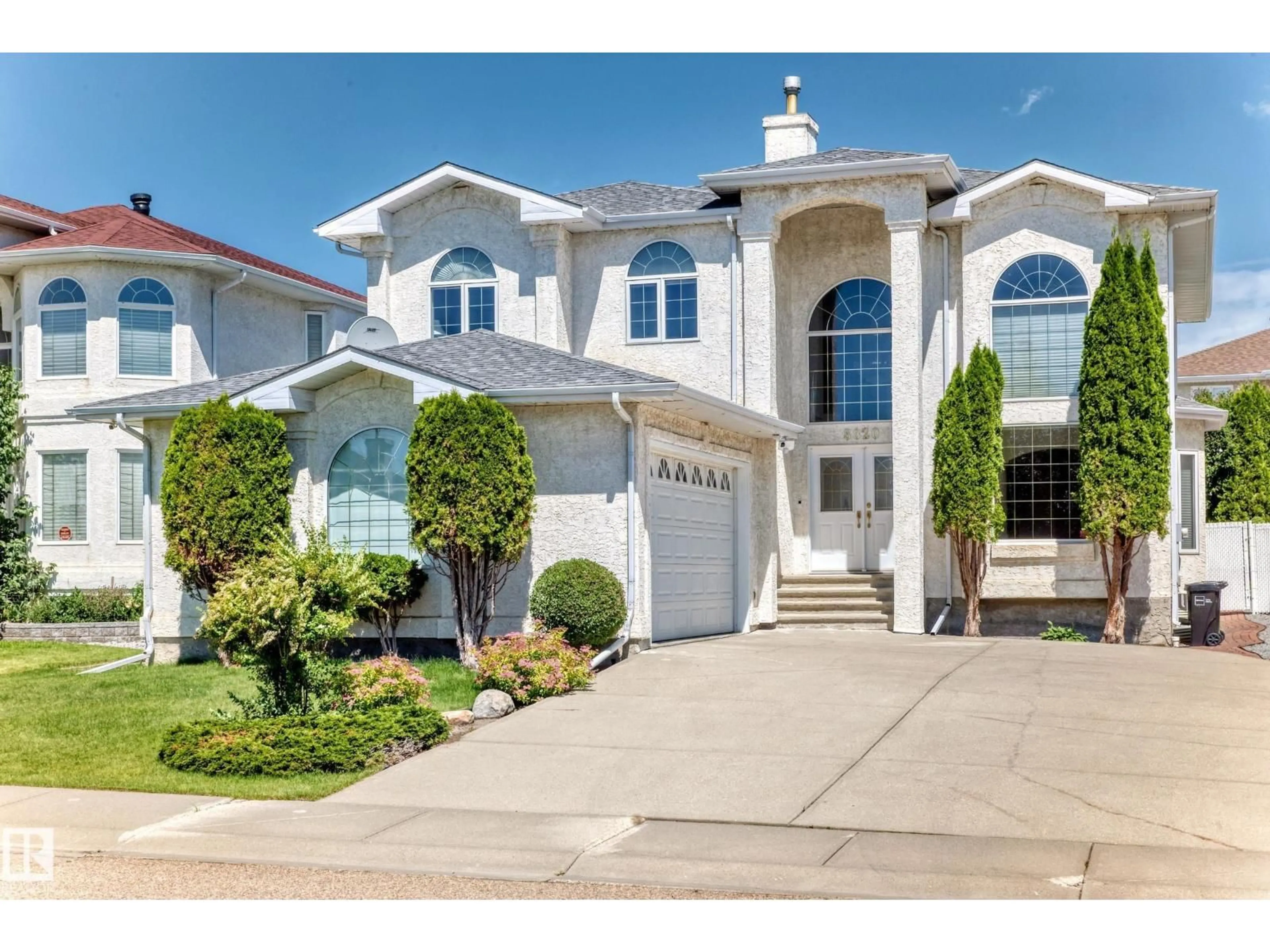 Home with vinyl exterior material, street for 8820 158 AV, Edmonton Alberta T5Z3E1