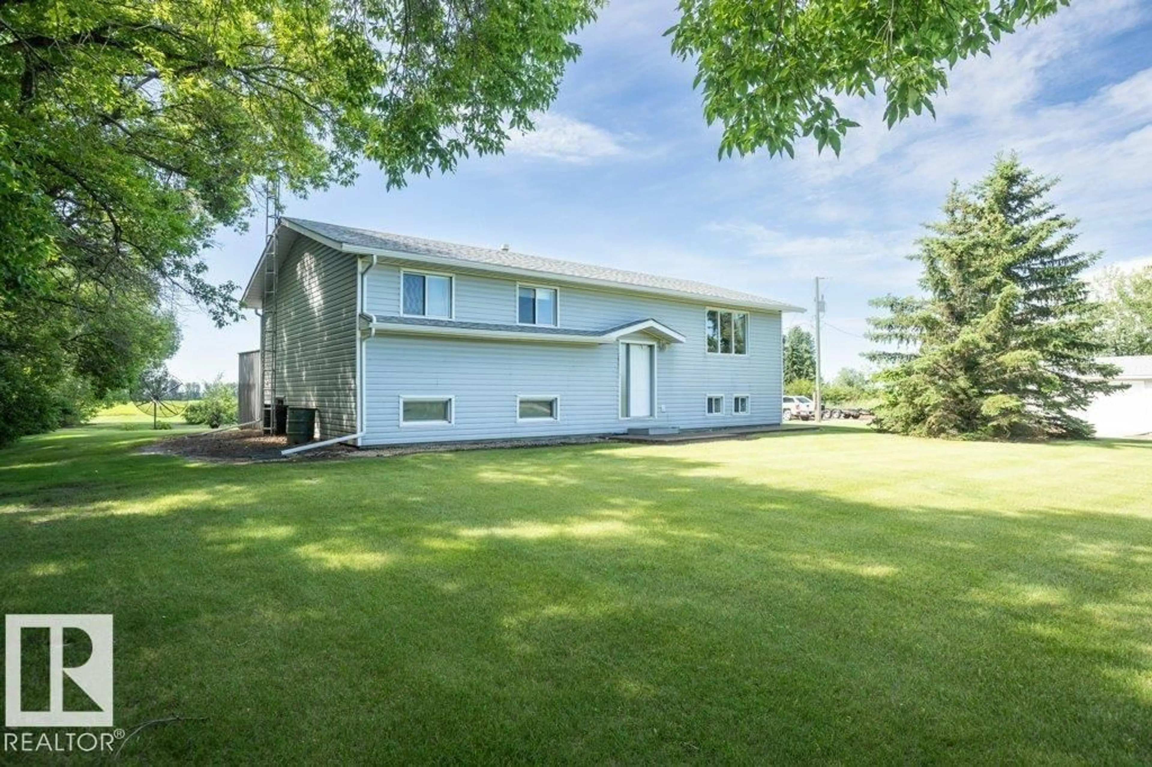 A pic from outside/outdoor area/front of a property/back of a property/a pic from drone, unknown for 25023 TWP RD 612, Rural Westlock County Alberta T0G1S0