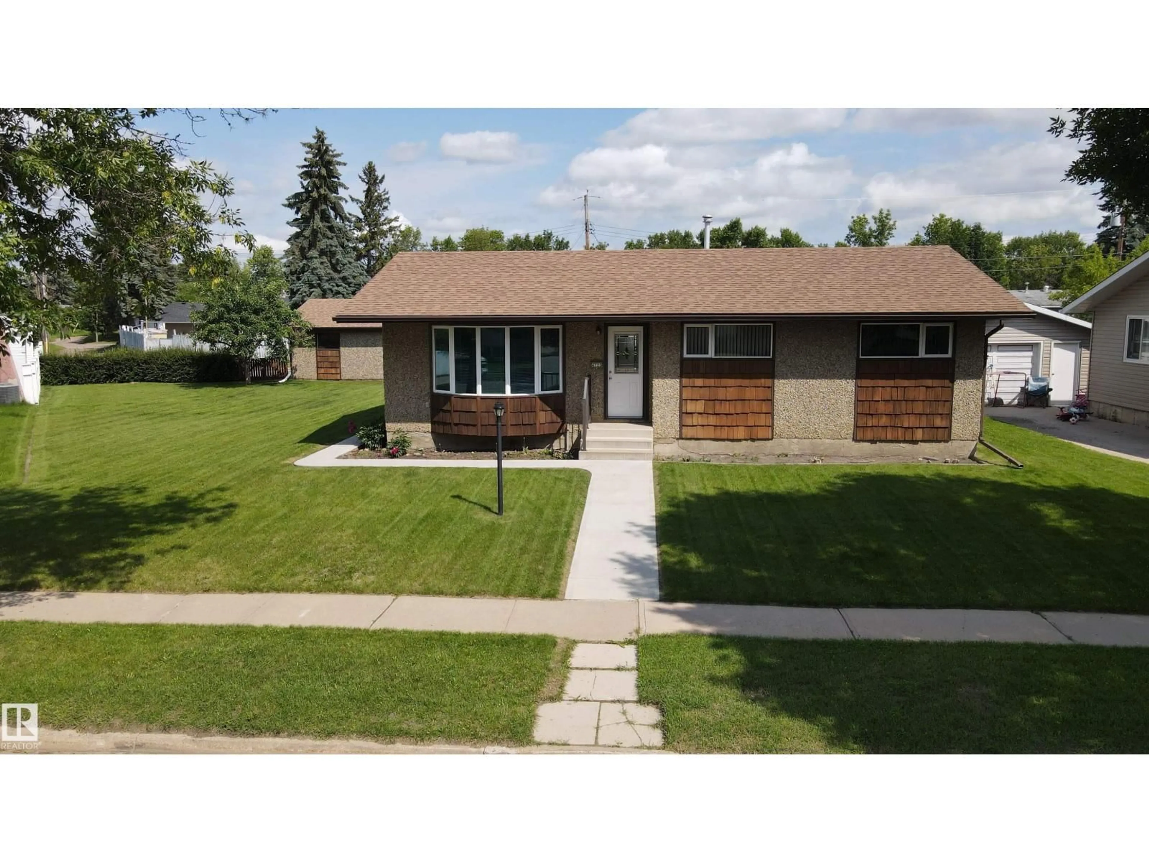 A pic from outside/outdoor area/front of a property/back of a property/a pic from drone, street for 4725 43 AV, Bonnyville Town Alberta T9N1N5