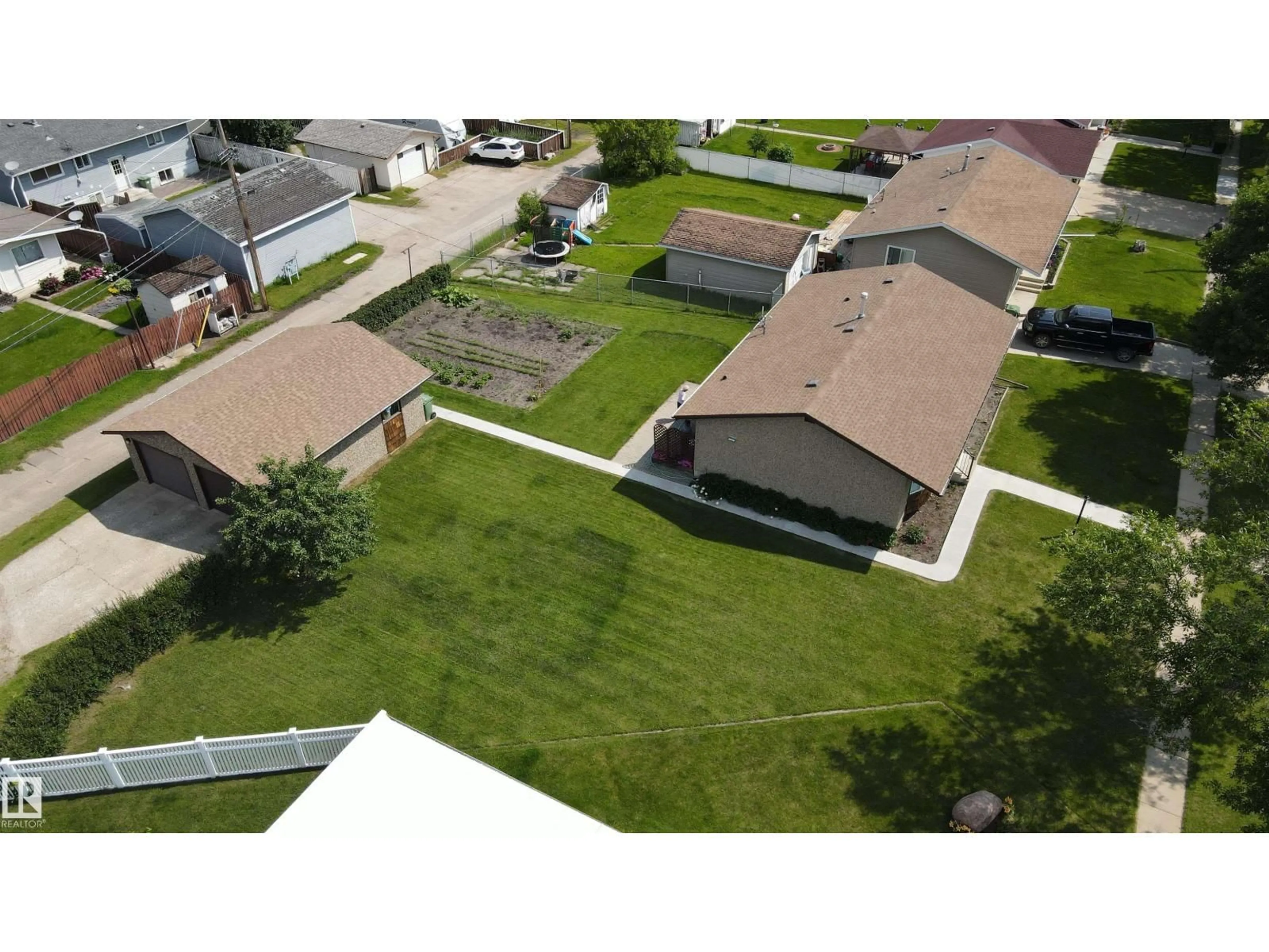 A pic from outside/outdoor area/front of a property/back of a property/a pic from drone, street for 4725 43 AV, Bonnyville Town Alberta T9N1N5