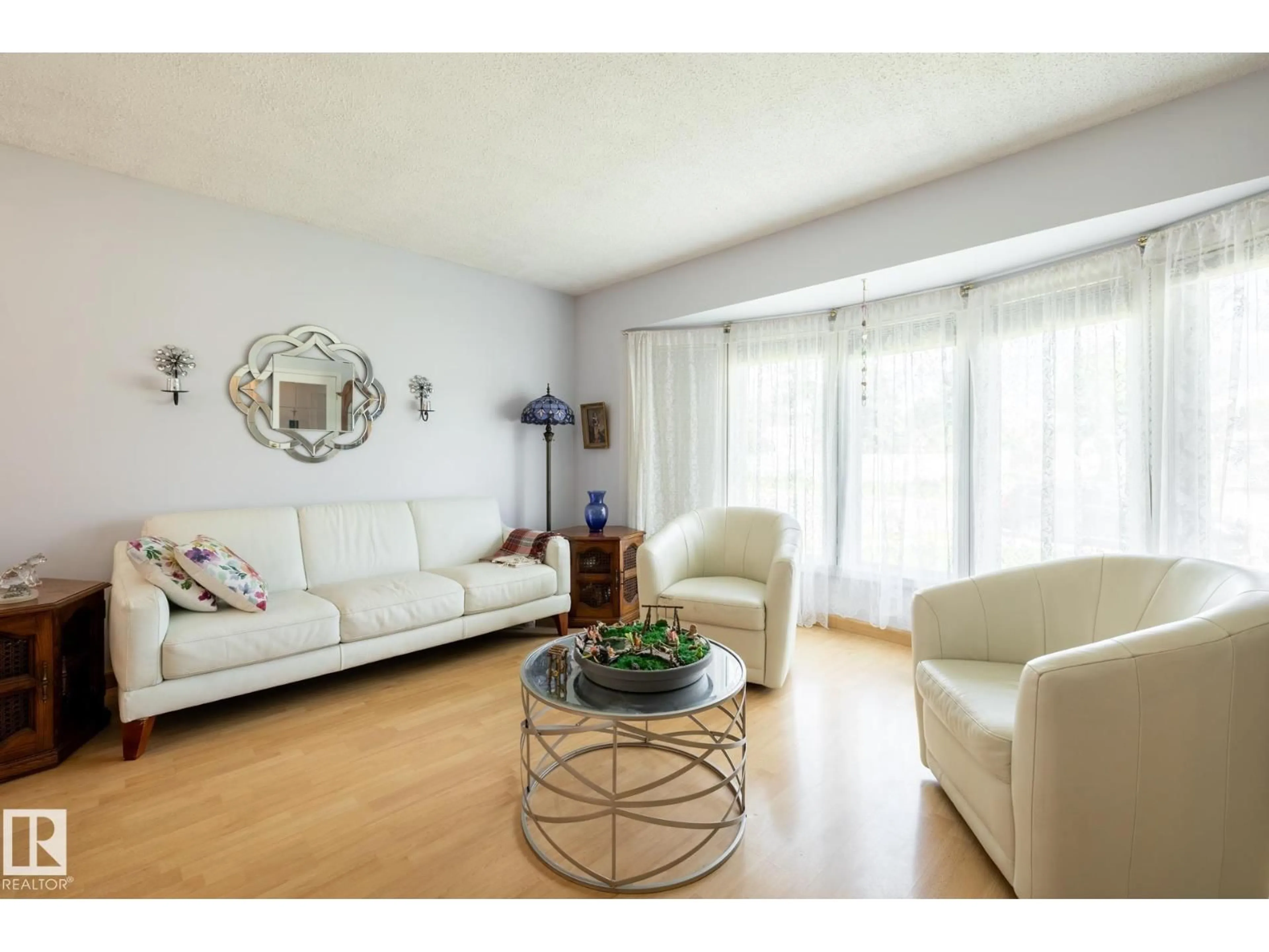 Living room with furniture, wood/laminate floor for 2309 MILLBOURNE RD, Edmonton Alberta T6K1E2