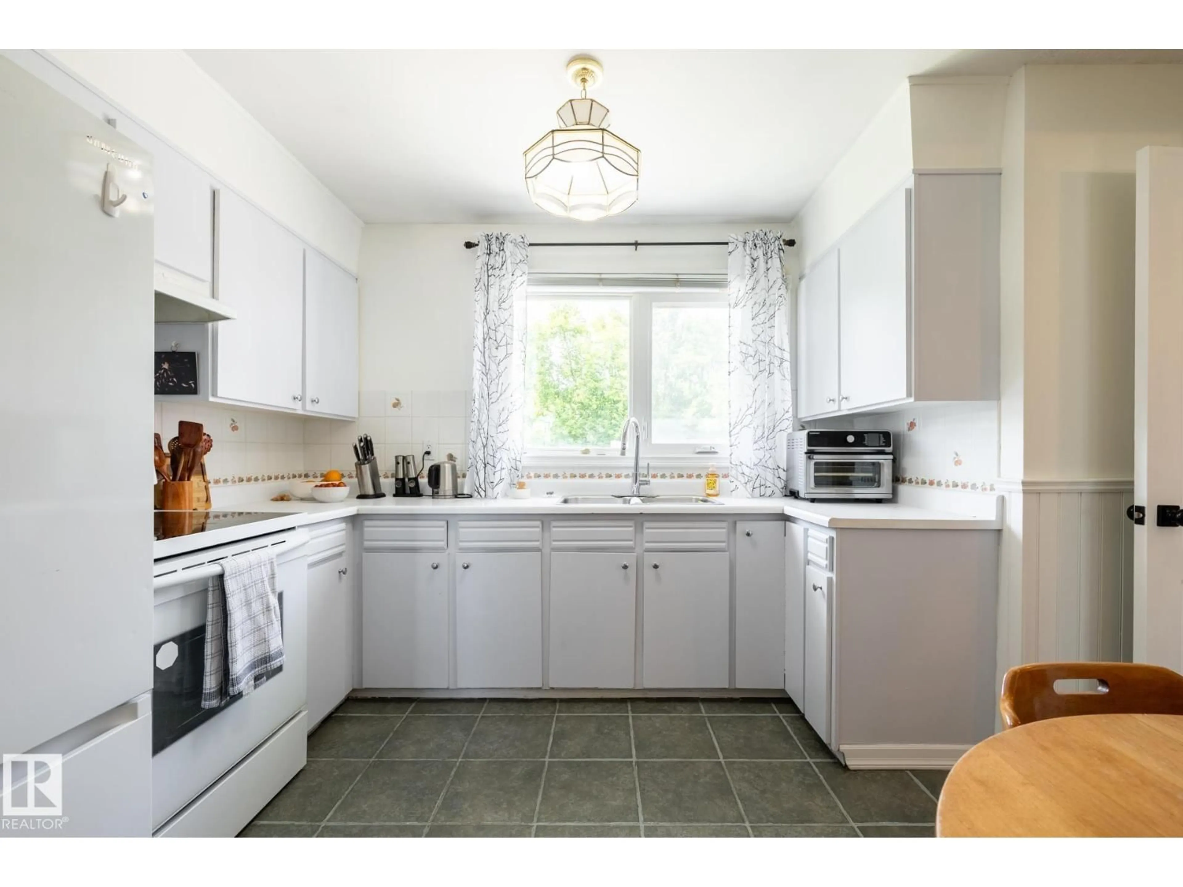 Standard kitchen, ceramic/tile floor for 2309 MILLBOURNE RD, Edmonton Alberta T6K1E2