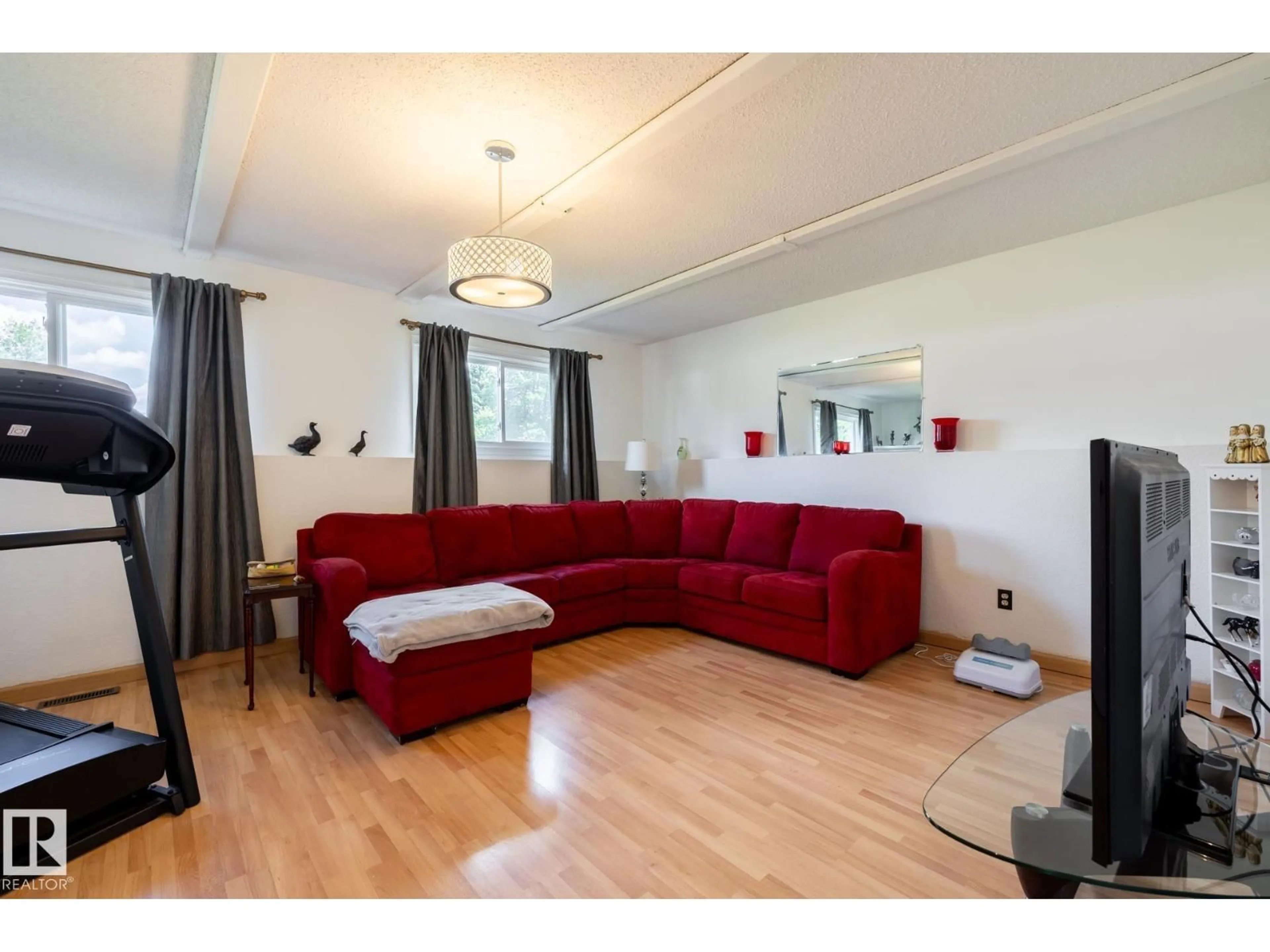 Living room with furniture, wood/laminate floor for 2309 MILLBOURNE RD, Edmonton Alberta T6K1E2