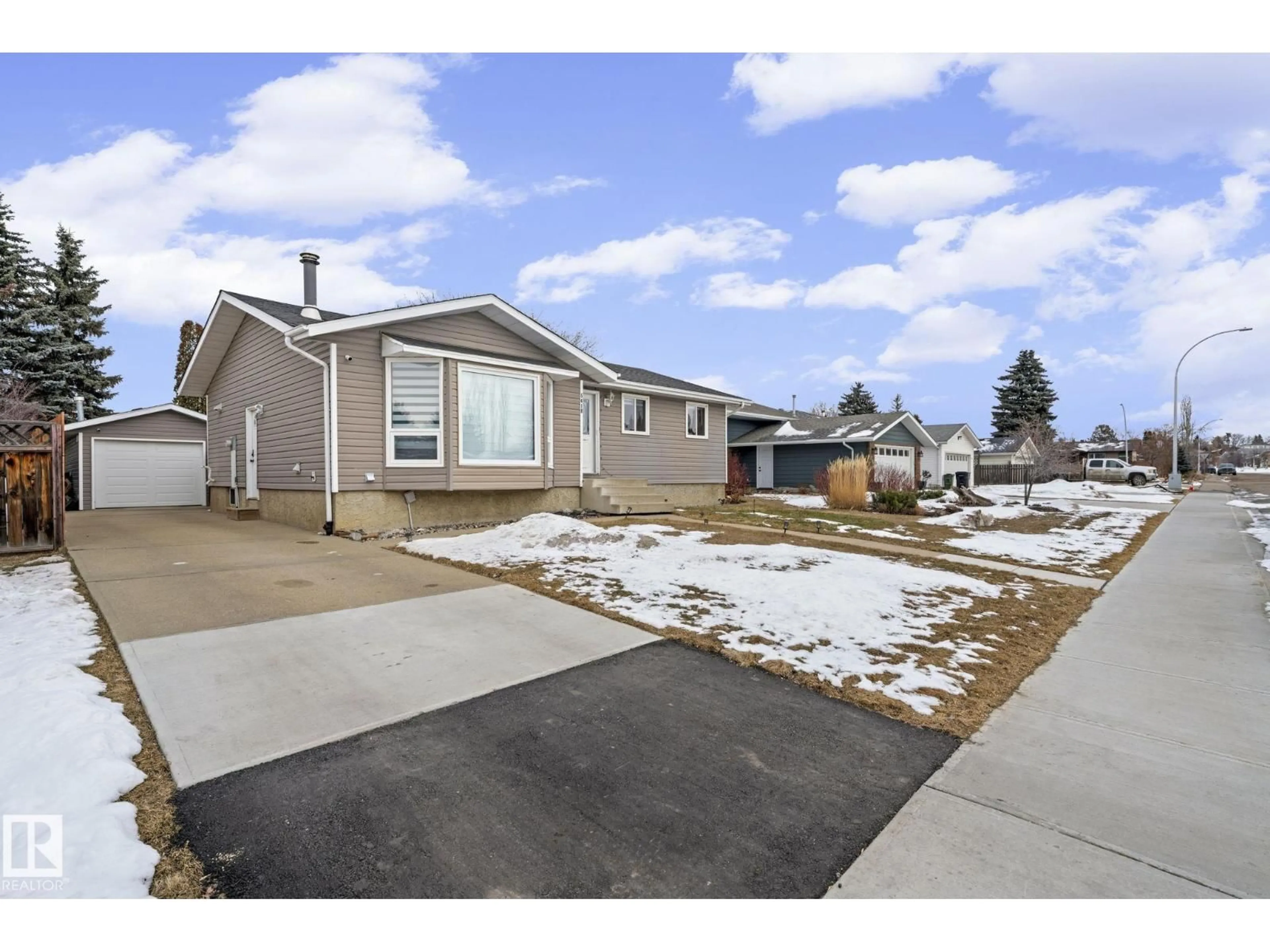 Home with vinyl exterior material, street for 5418 17A AV, Edmonton Alberta T6L1L2