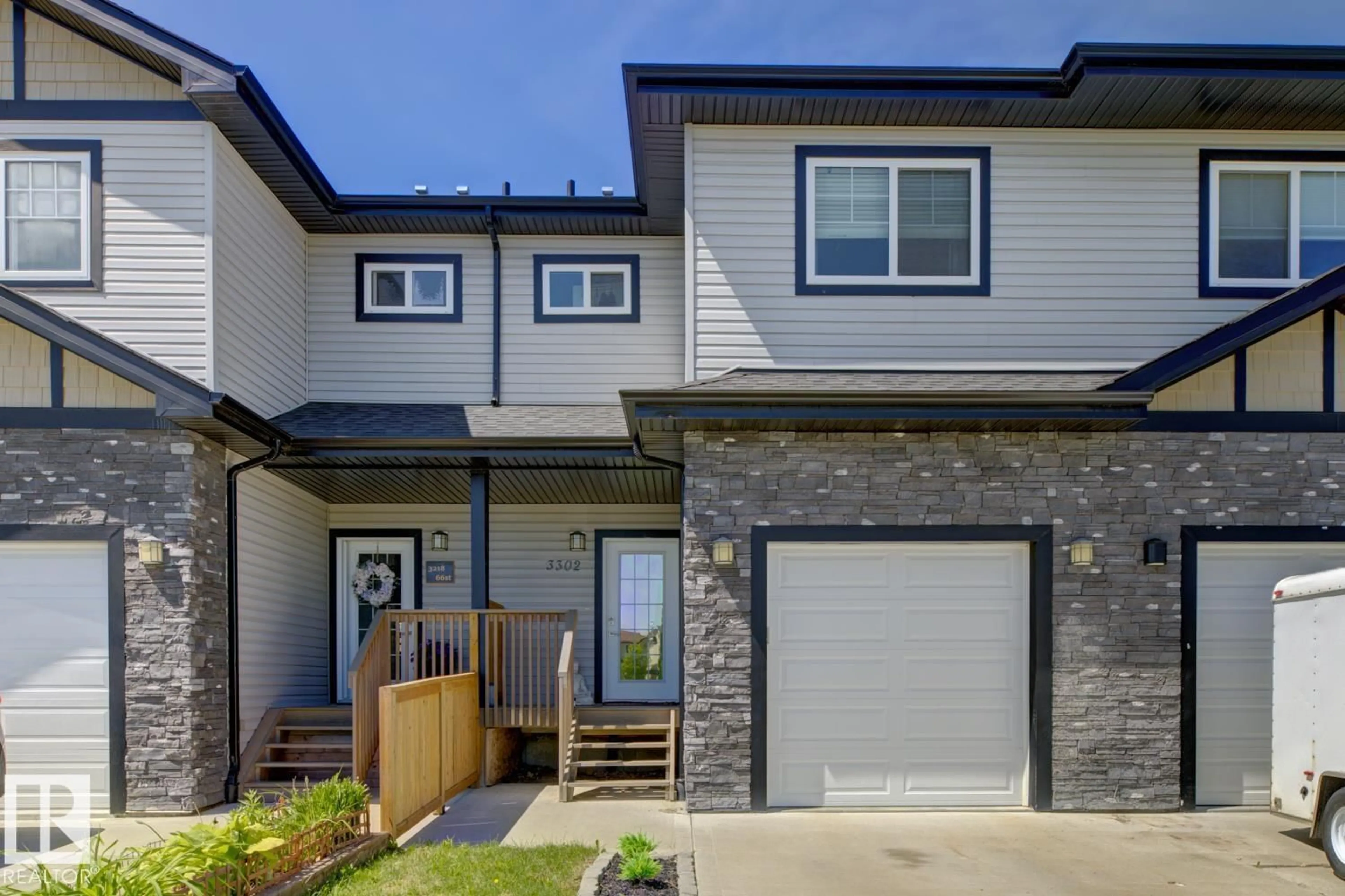Home with vinyl exterior material, street for 3302 66 ST, Beaumont Alberta T4X2X4