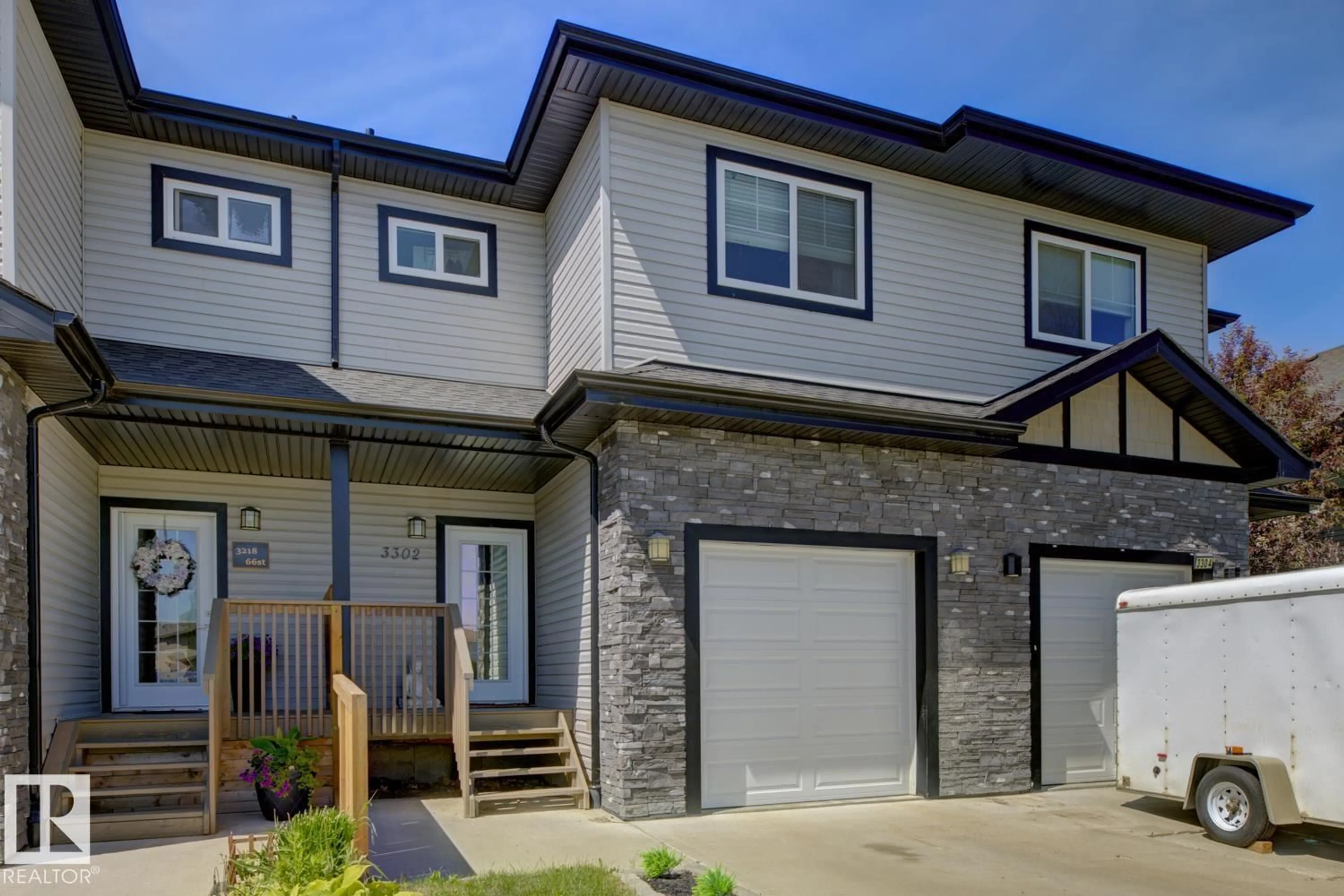 Home with vinyl exterior material, street for 3302 66 ST, Beaumont Alberta T4X2X4