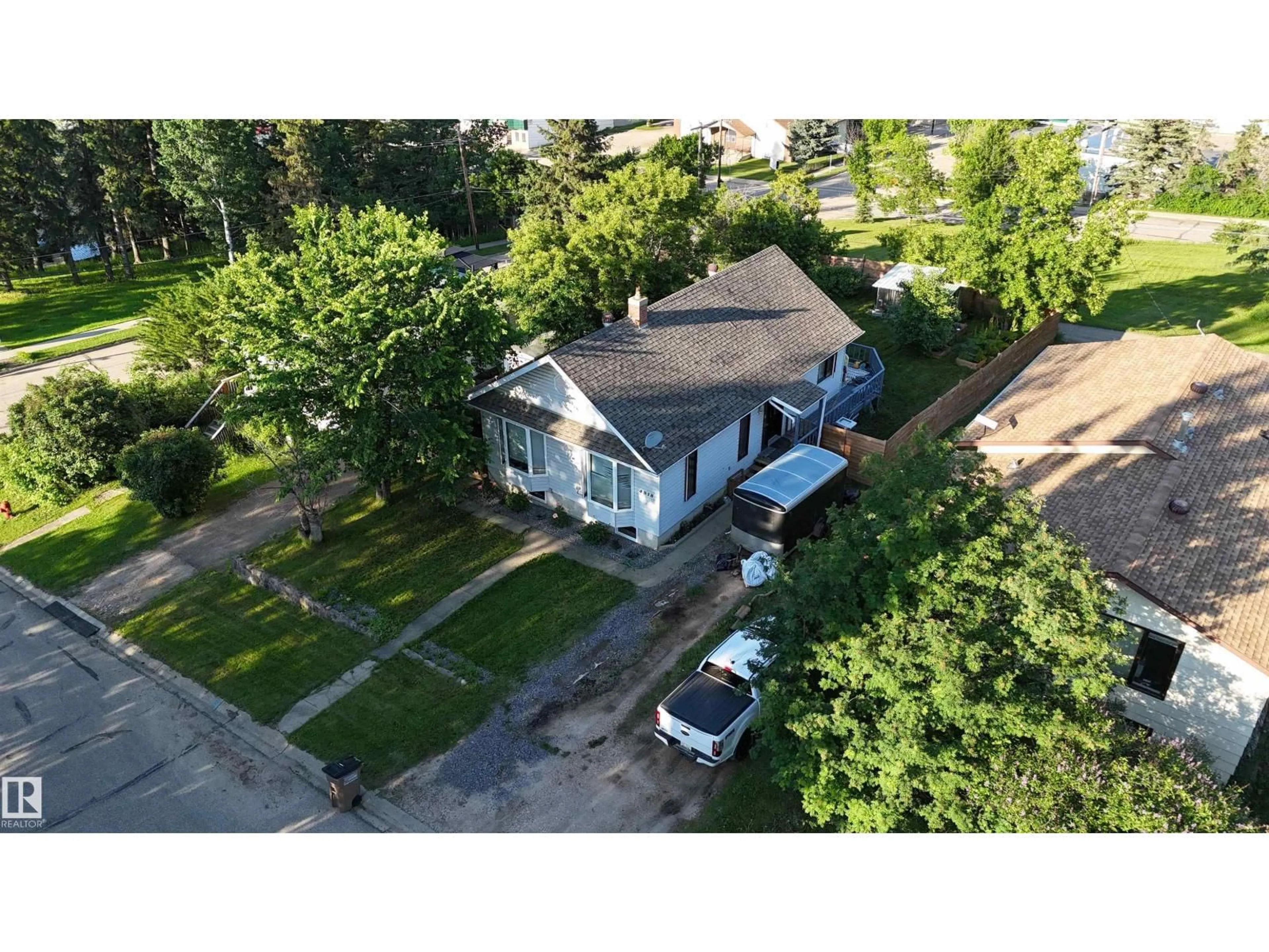 A pic from outside/outdoor area/front of a property/back of a property/a pic from drone, street for 4818 52 ST, Athabasca Town Alberta T9S1K8