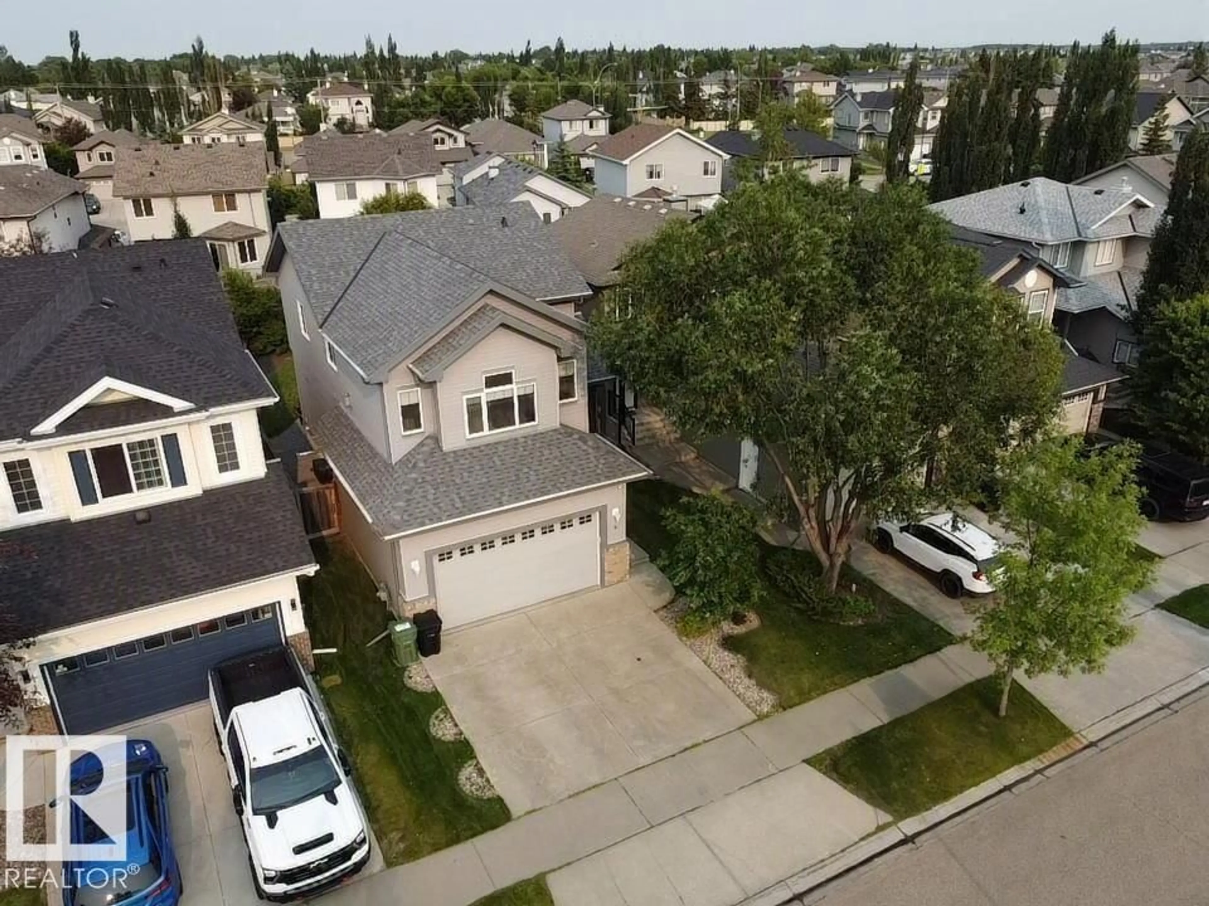 A pic from outside/outdoor area/front of a property/back of a property/a pic from drone, street for 9 SNOWBIRD CR, Leduc Alberta T9E0H5
