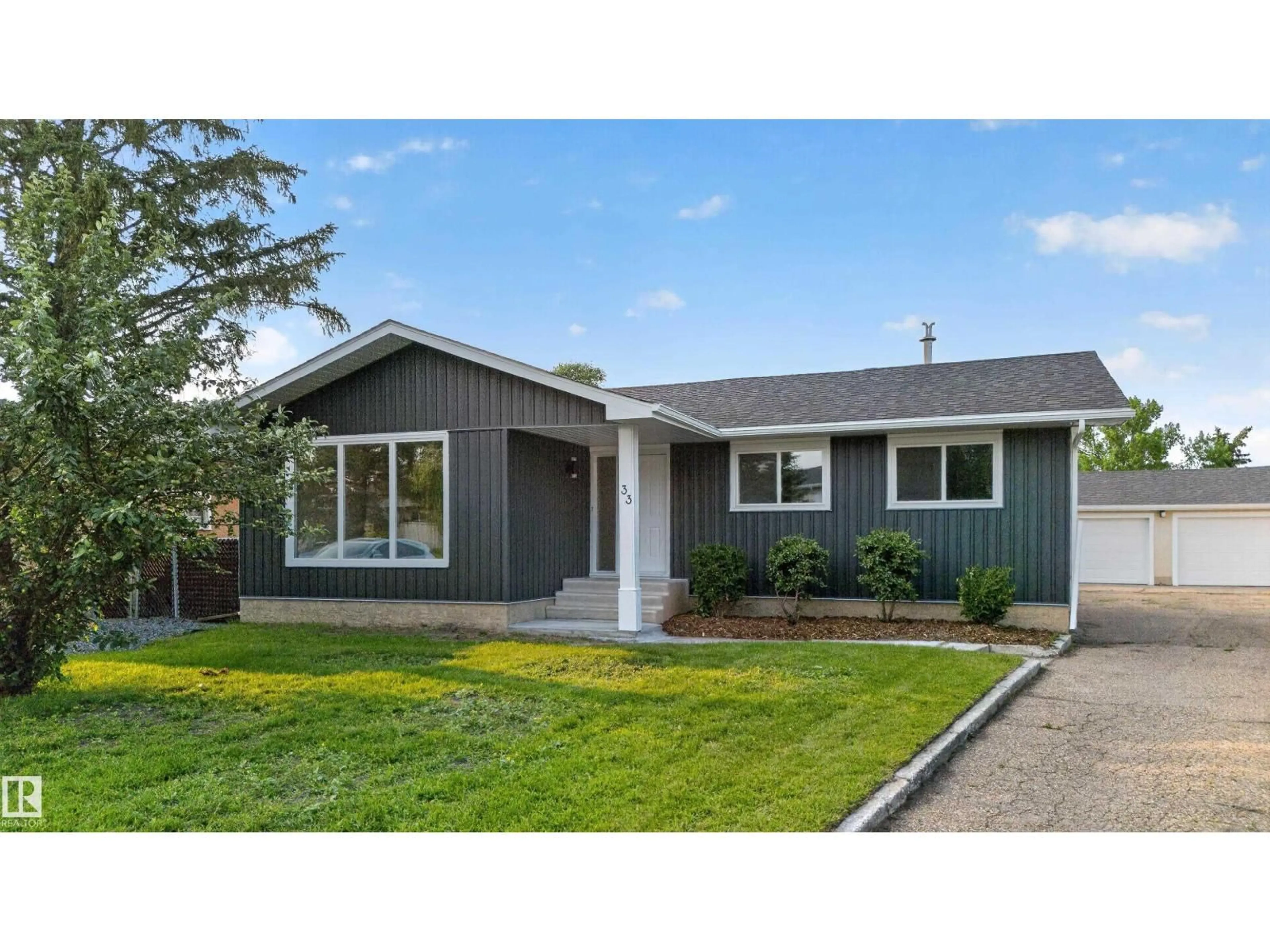 Home with vinyl exterior material, street for 33 BROOKSIDE AV, Spruce Grove Alberta T7X1B6