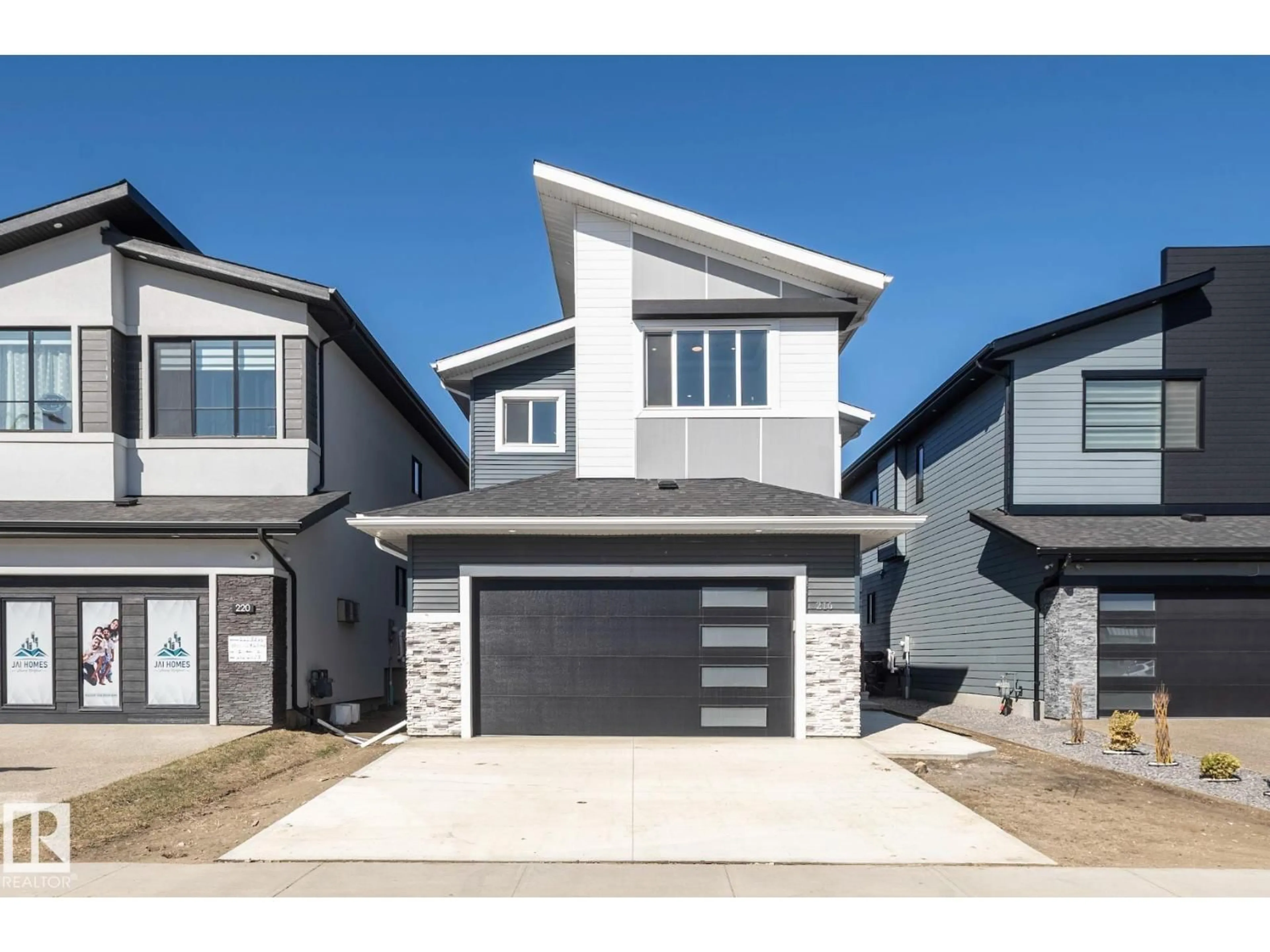 Home with vinyl exterior material, street for 216 33 ST, Edmonton Alberta T6X3C7